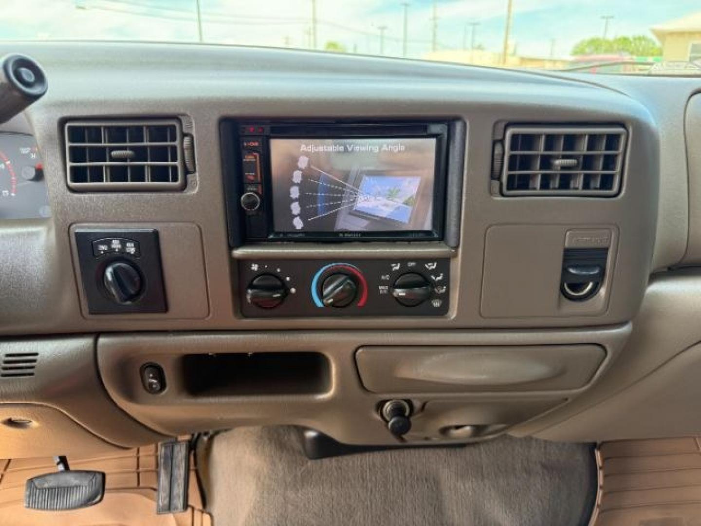 2002 BROWN /LEATHER Ford Super Duty F-250 (1FTNW21F02E) with an 73L V8 engine, Automatic transmission, located at 1175 N Woodruff Ave, Idaho Falls, ID, 83401, 43.506901, -111.999657 - This 2002 Ford F-250 Super Duty is a heavy-duty pickup built for serious work and strong diesel performance. Powered by the legendary 7.3L Power Stroke diesel, it delivers the low-end torque and hauling capability these trucks are known for. It comes lifted and sits on XD wheels, giving it an aggres- Photo#40