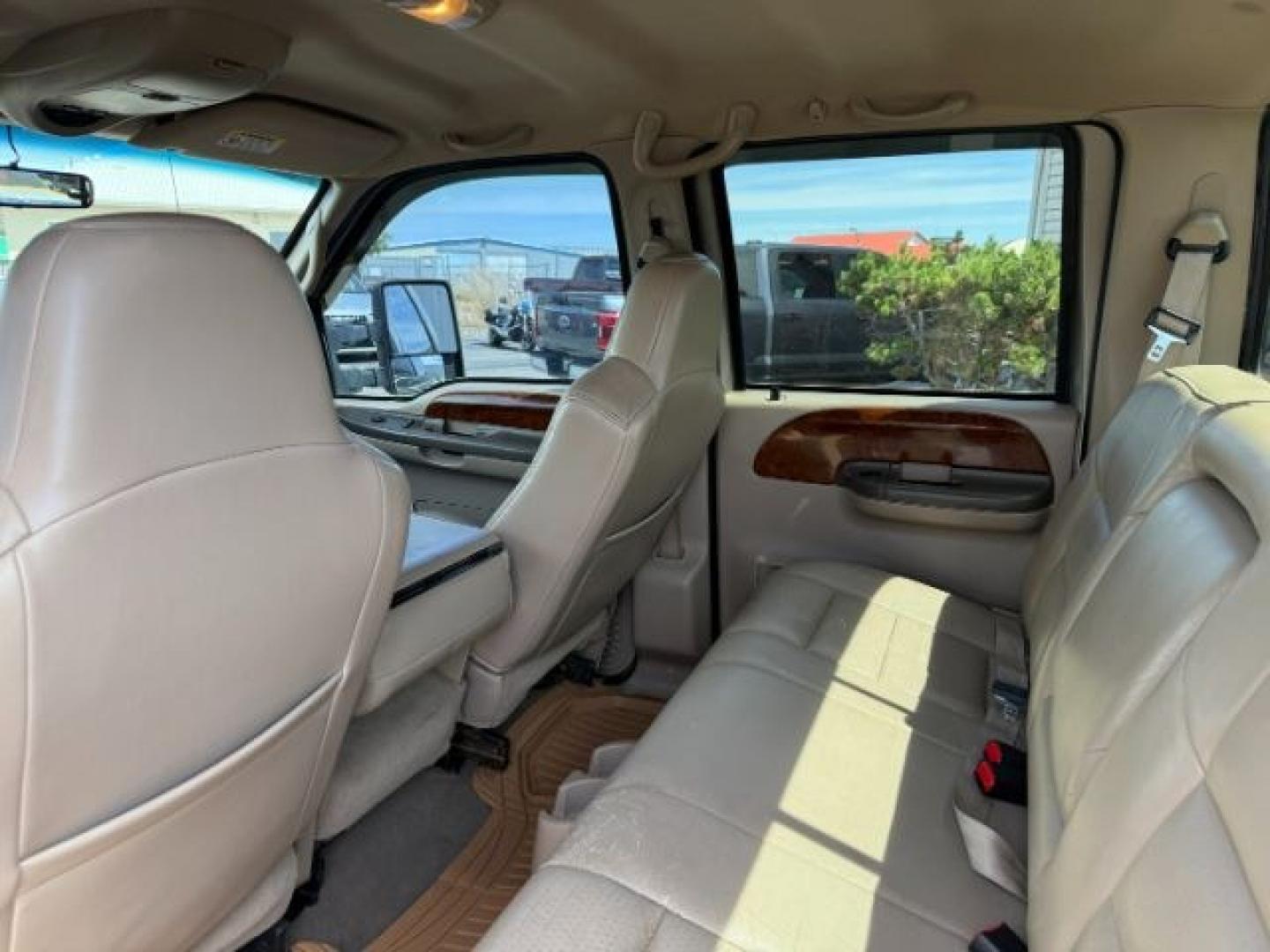 2002 BROWN /LEATHER Ford Super Duty F-250 (1FTNW21F02E) with an 73L V8 engine, Automatic transmission, located at 1175 N Woodruff Ave, Idaho Falls, ID, 83401, 43.506901, -111.999657 - This 2002 Ford F-250 Super Duty is a heavy-duty pickup built for serious work and strong diesel performance. Powered by the legendary 7.3L Power Stroke diesel, it delivers the low-end torque and hauling capability these trucks are known for. It comes lifted and sits on XD wheels, giving it an aggres- Photo#48