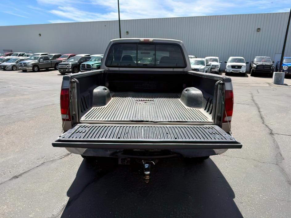 2002 BROWN /LEATHER Ford Super Duty F-250 lariat (1FTNW21F02E) with an 7.3L V8 engine, AUTOMATIC transmission, located at 1235 N Woodruff Ave., Idaho Falls, 83401, (208) 523-1053, 43.507172, -112.000488 - At Timberline Auto, finding a great deal on your next vehicle is always easy! Our experienced sales staff's goal is to help find you the right vehicle at the right price! Our knowledgeable finance department has options for almost any credit score. We offer extended service contract options to prote- Photo#4