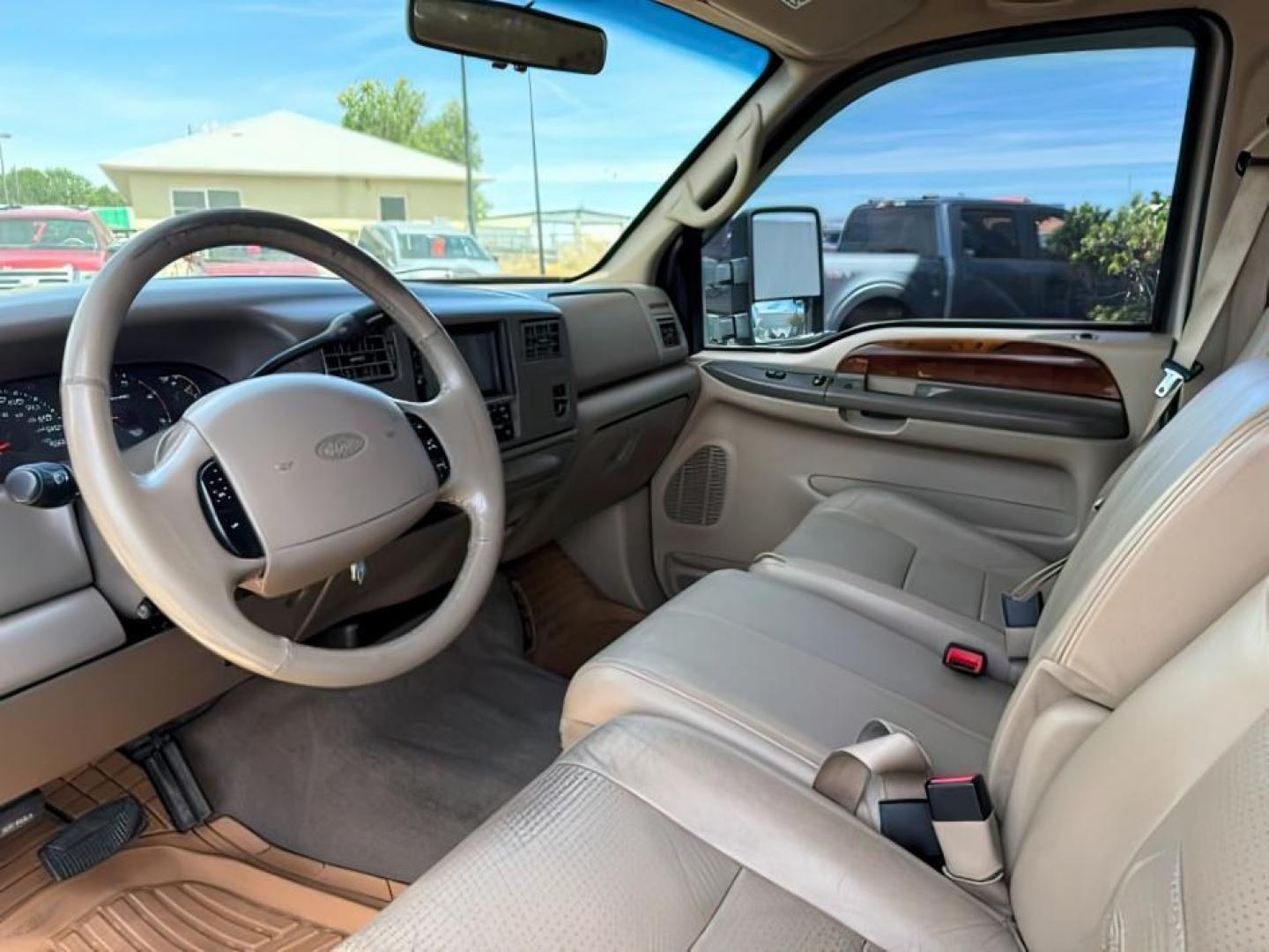 2002 BROWN /LEATHER Ford Super Duty F-250 (1FTNW21F02E) with an 73L V8 engine, Automatic transmission, located at 1175 N Woodruff Ave, Idaho Falls, ID, 83401, 43.506901, -111.999657 - This 2002 Ford F-250 Super Duty is a heavy-duty pickup built for serious work and strong diesel performance. Powered by the legendary 7.3L Power Stroke diesel, it delivers the low-end torque and hauling capability these trucks are known for. It comes lifted and sits on XD wheels, giving it an aggres- Photo#13