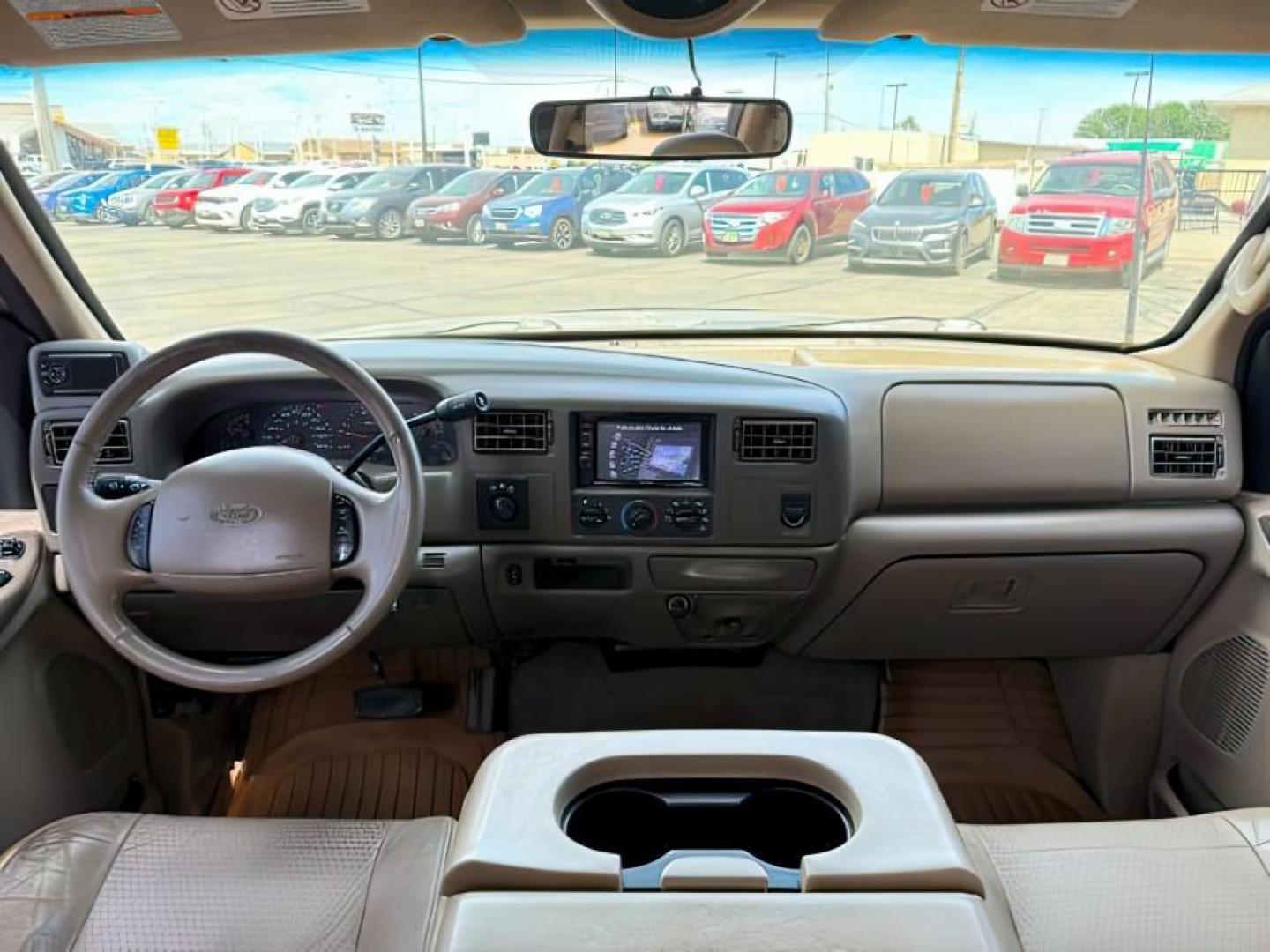 2002 BROWN /LEATHER Ford Super Duty F-250 (1FTNW21F02E) with an 73L V8 engine, Automatic transmission, located at 1175 N Woodruff Ave, Idaho Falls, ID, 83401, 43.506901, -111.999657 - This 2002 Ford F-250 Super Duty is a heavy-duty pickup built for serious work and strong diesel performance. Powered by the legendary 7.3L Power Stroke diesel, it delivers the low-end torque and hauling capability these trucks are known for. It comes lifted and sits on XD wheels, giving it an aggres- Photo#22