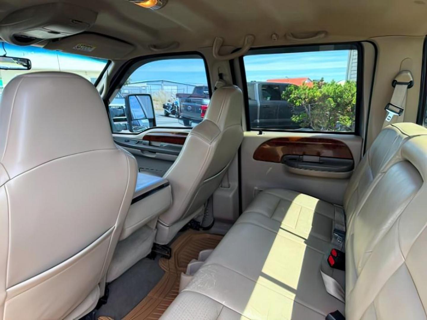 2002 BROWN /LEATHER Ford Super Duty F-250 (1FTNW21F02E) with an 73L V8 engine, Automatic transmission, located at 1175 N Woodruff Ave, Idaho Falls, ID, 83401, 43.506901, -111.999657 - This 2002 Ford F-250 Super Duty is a heavy-duty pickup built for serious work and strong diesel performance. Powered by the legendary 7.3L Power Stroke diesel, it delivers the low-end torque and hauling capability these trucks are known for. It comes lifted and sits on XD wheels, giving it an aggres- Photo#23