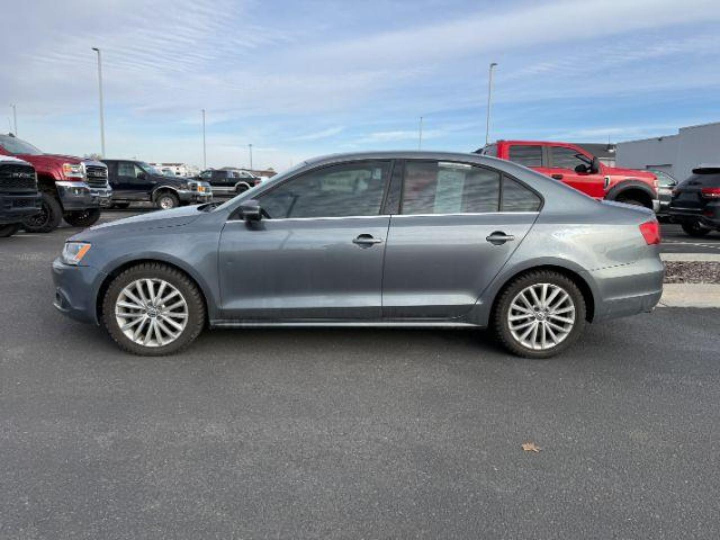 2013 Platinum Gray Metallic /Titan Black Volkswagen Jetta (3VWLL7AJ1DM) with an 2L I-4 diesel direct injection engine, Automatic transmission, located at 1175 N Woodruff Ave, Idaho Falls, ID, 83401, 43.506901, -111.999657 - At Timberline Auto, finding a great deal on your next vehicle is always easy! Our experienced sales staff's goal is to help find you the right vehicle at the right price! Our knowledgeable finance department has options for almost any credit score. We offer extended service contract options to prote - Photo#1