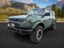 2022 GREEN /Black Onyx Ford Bronco (1FMEE5DPXNL) with an EcoBoost 27L V-6 portdirect injection engine, Automatic transmission, located at 1175 N Woodruff Ave, Idaho Falls, ID, 83401, 43.506901, -111.999657 - At Timberline Auto, finding a great deal on your next vehicle is always easy! Our experienced sales staff's goal is to help find you the right vehicle at the right price! Our knowledgeable finance department has options for almost any credit score. We offer extended service contract options to prote - Photo#1
