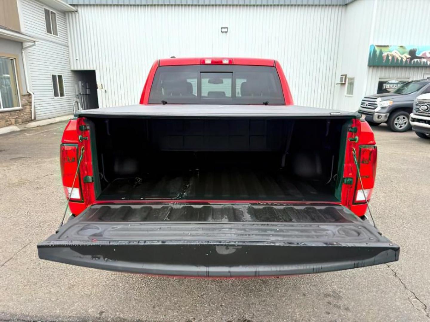 2016 RED /Diesel Grey/Black Ram 1500 (1C6RR7LG6GS) with an Pentastar 36L V-6 DOHC engine, Automatic transmission, located at 1175 N Woodruff Ave, Idaho Falls, ID, 83401, 43.506901, -111.999657 - At Timberline Auto, finding a great deal on your next vehicle is always easy! Our experienced sales staff's goal is to help find you the right vehicle at the right price! Our knowledgeable finance department has options for almost any credit score. We offer extended service contract options to prote - Photo#5
