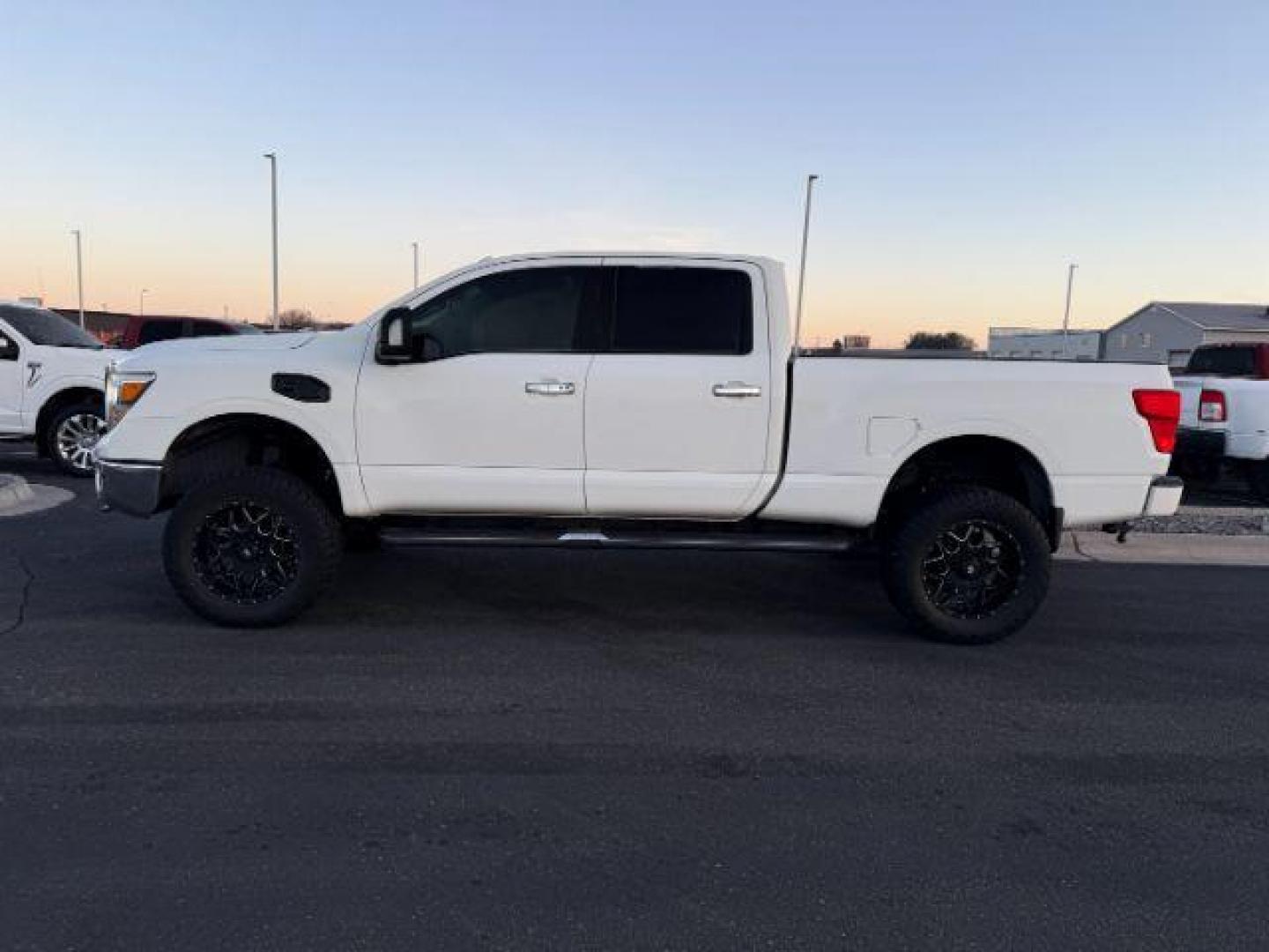 2017 WHITE /LEATHER Nissan Titan XD (1N6BA1F42HN) with an 50L V8 TURBO engine, Automatic transmission, located at 1175 N Woodruff Ave, Idaho Falls, ID, 83401, 43.506901, -111.999657 - At Timberline Auto, finding a great deal on your next vehicle is always easy! Our experienced sales staff's goal is to help find you the right vehicle at the right price! Our knowledgeable finance department has options for almost any credit score. We offer extended service contract options to prote - Photo#1