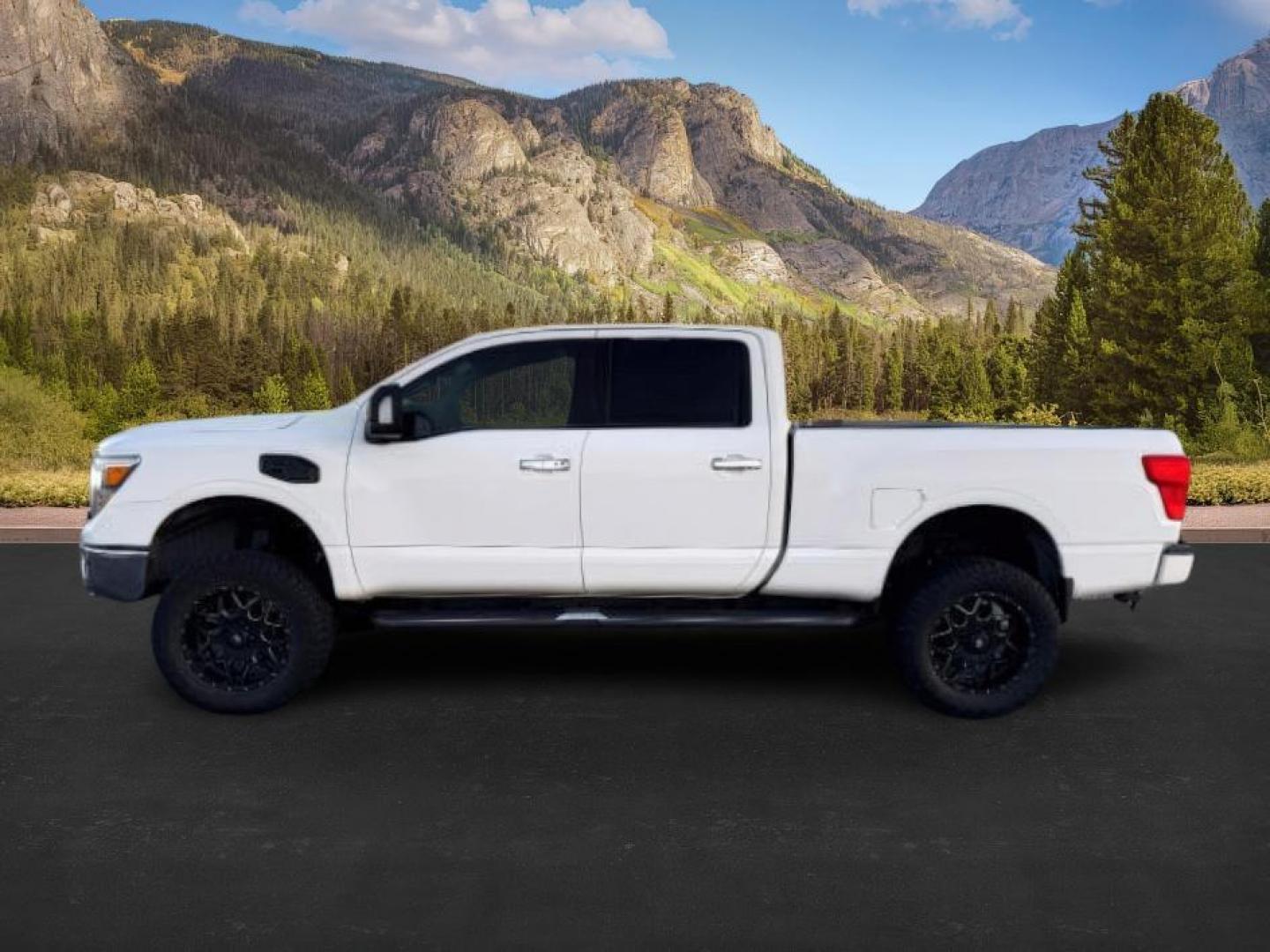 2017 WHITE /LEATHER Nissan Titan XD (1N6BA1F42HN) with an 50L V8 TURBO engine, Automatic transmission, located at 1175 N Woodruff Ave, Idaho Falls, ID, 83401, 43.506901, -111.999657 - At Timberline Auto, finding a great deal on your next vehicle is always easy! Our experienced sales staff's goal is to help find you the right vehicle at the right price! Our knowledgeable finance department has options for almost any credit score. We offer extended service contract options to prote - Photo#0