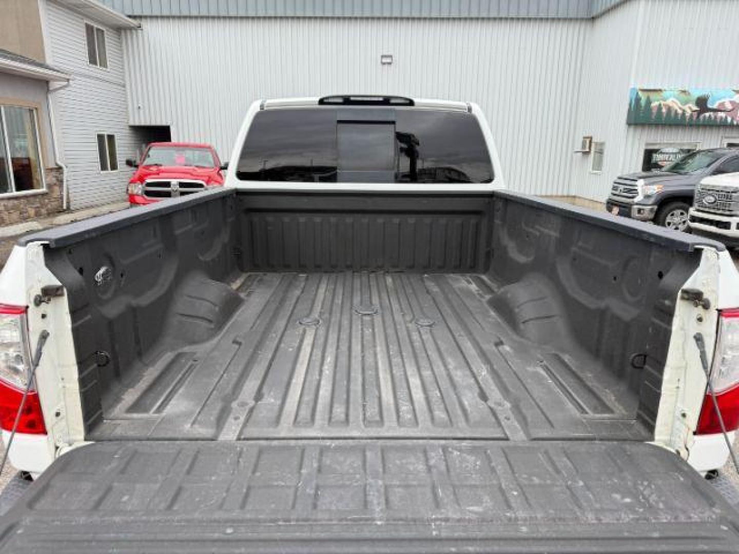 2017 WHITE /LEATHER Nissan Titan XD (1N6BA1F42HN) with an 50L V8 TURBO engine, Automatic transmission, located at 1175 N Woodruff Ave, Idaho Falls, ID, 83401, 43.506901, -111.999657 - Photo#28