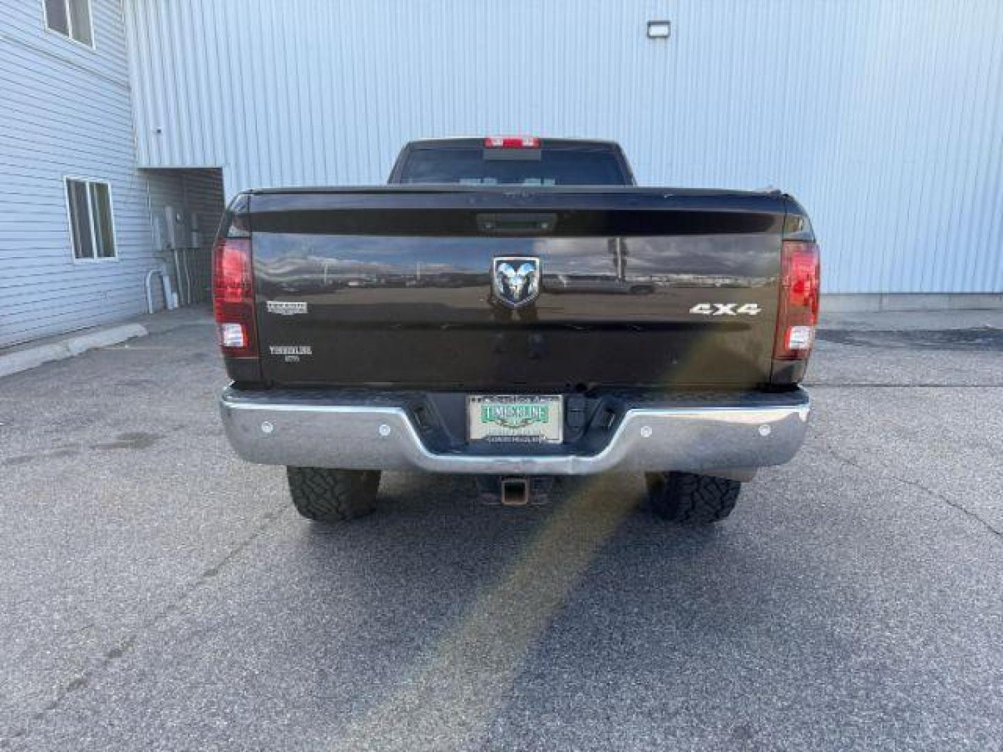 2017 BROWN /Black Ram 3500 (3C63R3JL9HG) with an Cummins 67L I-6 diesel direct injection engine, Automatic transmission, located at 1175 N Woodruff Ave, Idaho Falls, ID, 83401, 43.506901, -111.999657 - At Timberline Auto, finding a great deal on your next vehicle is always easy! Our experienced sales staff's goal is to help find you the right vehicle at the right price! Our knowledgeable finance department has options for almost any credit score. We offer extended service contract options to prote - Photo#23