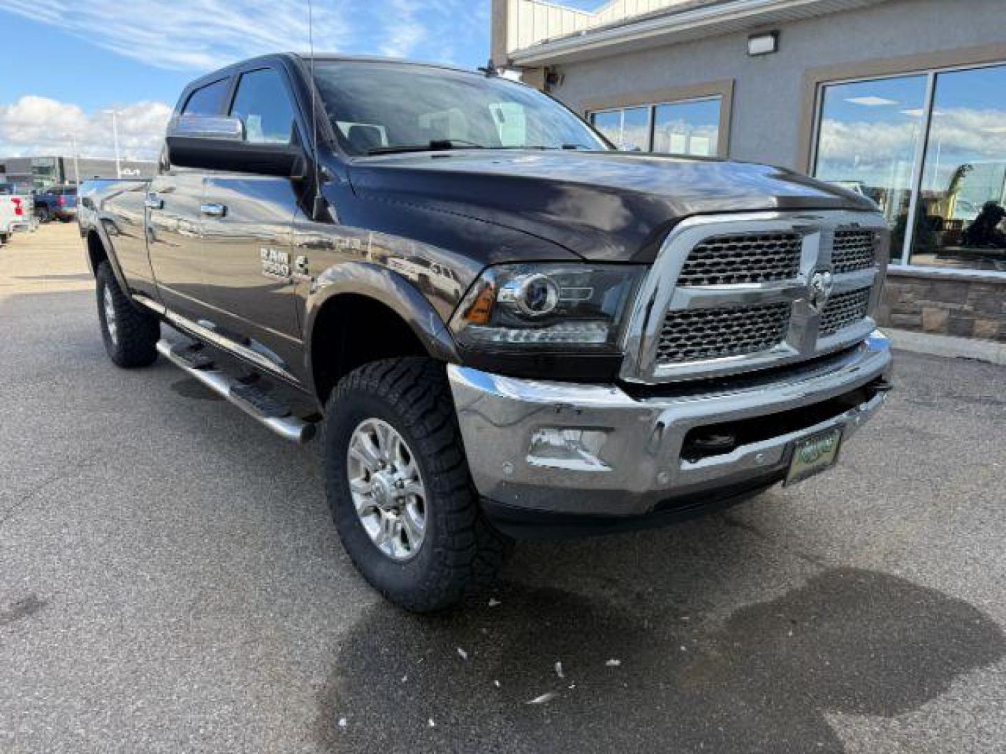 2017 BROWN /Black Ram 3500 (3C63R3JL9HG) with an Cummins 67L I-6 diesel direct injection engine, Automatic transmission, located at 1175 N Woodruff Ave, Idaho Falls, ID, 83401, 43.506901, -111.999657 - At Timberline Auto, finding a great deal on your next vehicle is always easy! Our experienced sales staff's goal is to help find you the right vehicle at the right price! Our knowledgeable finance department has options for almost any credit score. We offer extended service contract options to prote - Photo#25