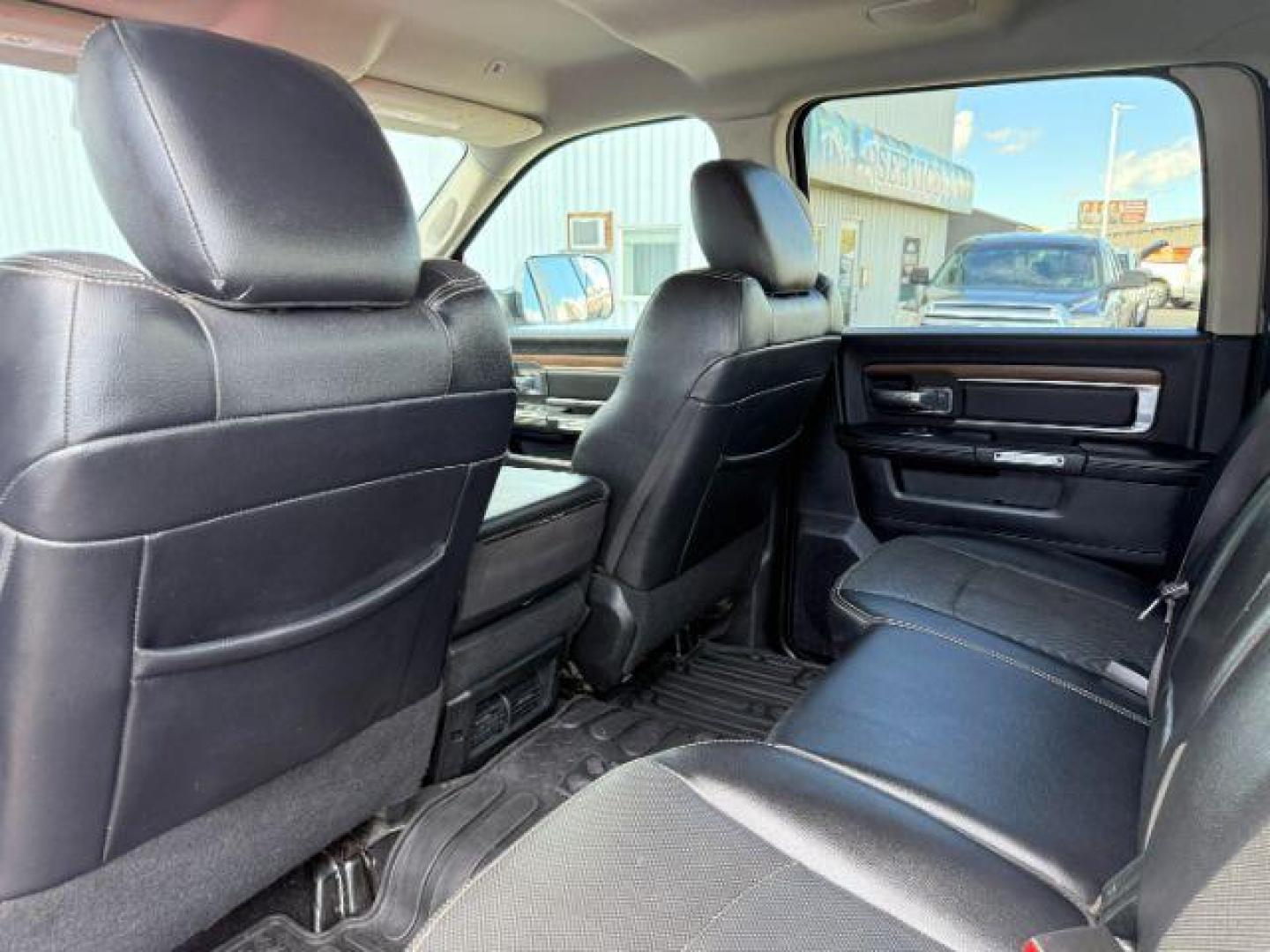 2017 BROWN /Black Ram 3500 (3C63R3JL9HG) with an Cummins 67L I-6 diesel direct injection engine, Automatic transmission, located at 1175 N Woodruff Ave, Idaho Falls, ID, 83401, 43.506901, -111.999657 - At Timberline Auto, finding a great deal on your next vehicle is always easy! Our experienced sales staff's goal is to help find you the right vehicle at the right price! Our knowledgeable finance department has options for almost any credit score. We offer extended service contract options to prote - Photo#39