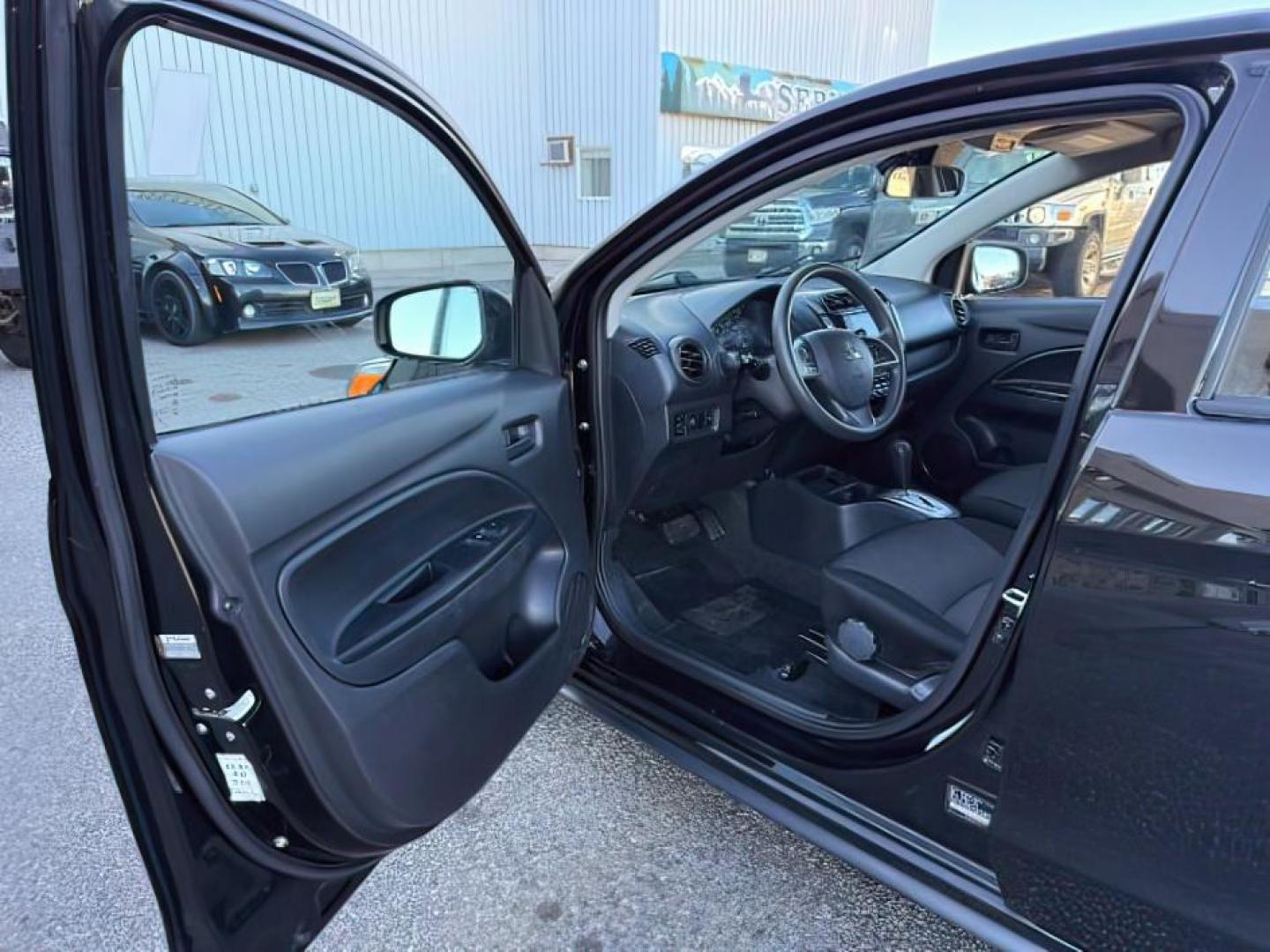 2022 BLACK /Black Mitsubishi Mirage (ML32AUHJ3NH) with an 12L I-3 DOHC engine, Automatic transmission, located at 1175 N Woodruff Ave, Idaho Falls, ID, 83401, 43.506901, -111.999657 - At Timberline Auto, finding a great deal on your next vehicle is always easy! Our experienced sales staff's goal is to help find you the right vehicle at the right price! Our knowledgeable finance department has options for almost any credit score. We offer extended service contract options to prote - Photo#11