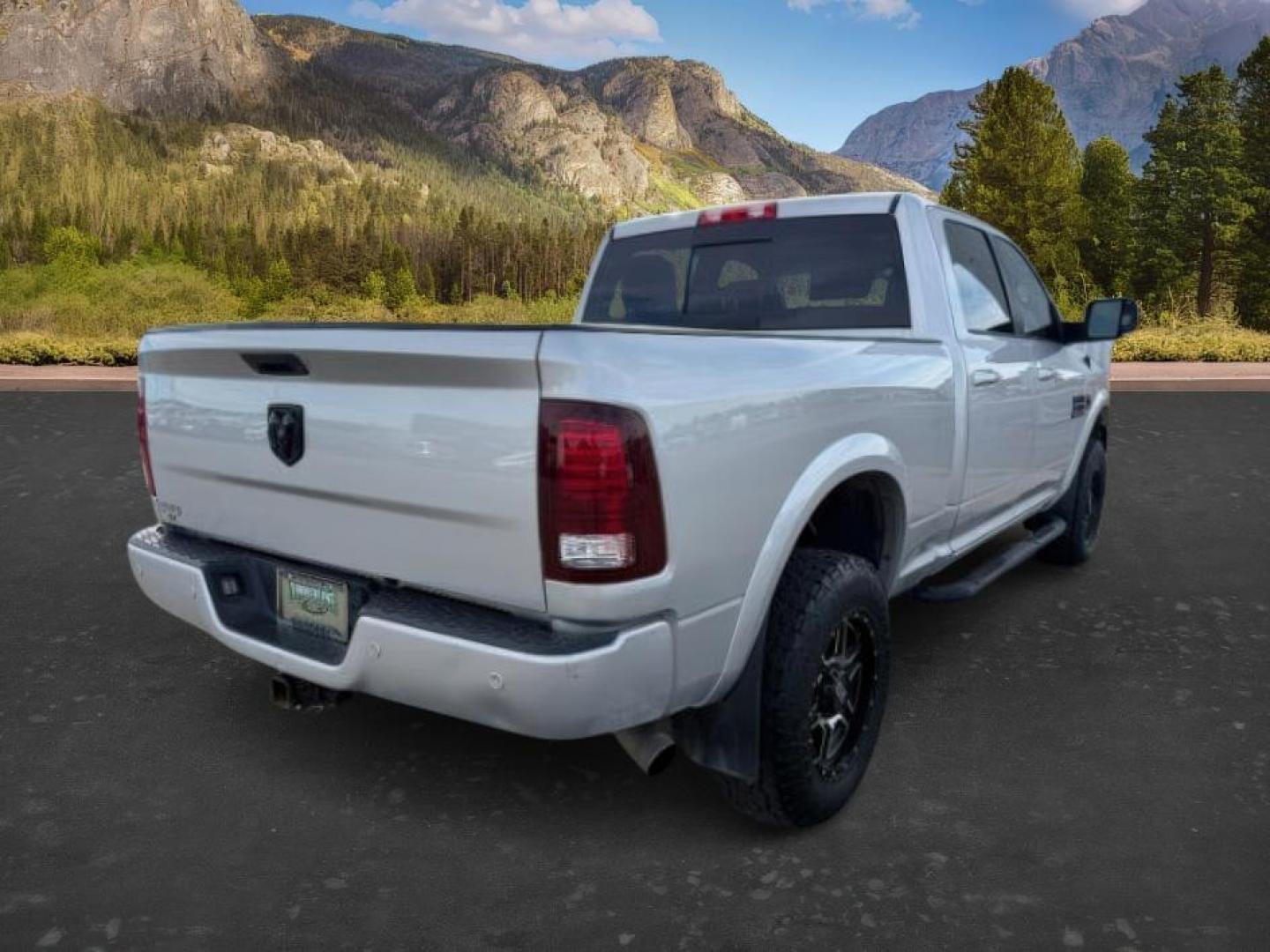 2018 SILVER /Black Ram 3500 (3C63R3EL4JG) with an Cummins 67L I-6 diesel direct injection engine, Automatic transmission, located at 1175 N Woodruff Ave, Idaho Falls, ID, 83401, 43.506901, -111.999657 - At Timberline Auto, finding a great deal on your next vehicle is always easy! Our experienced sales staff's goal is to help find you the right vehicle at the right price! Our knowledgeable finance department has options for almost any credit score. We offer extended service contract options to prote - Photo#6