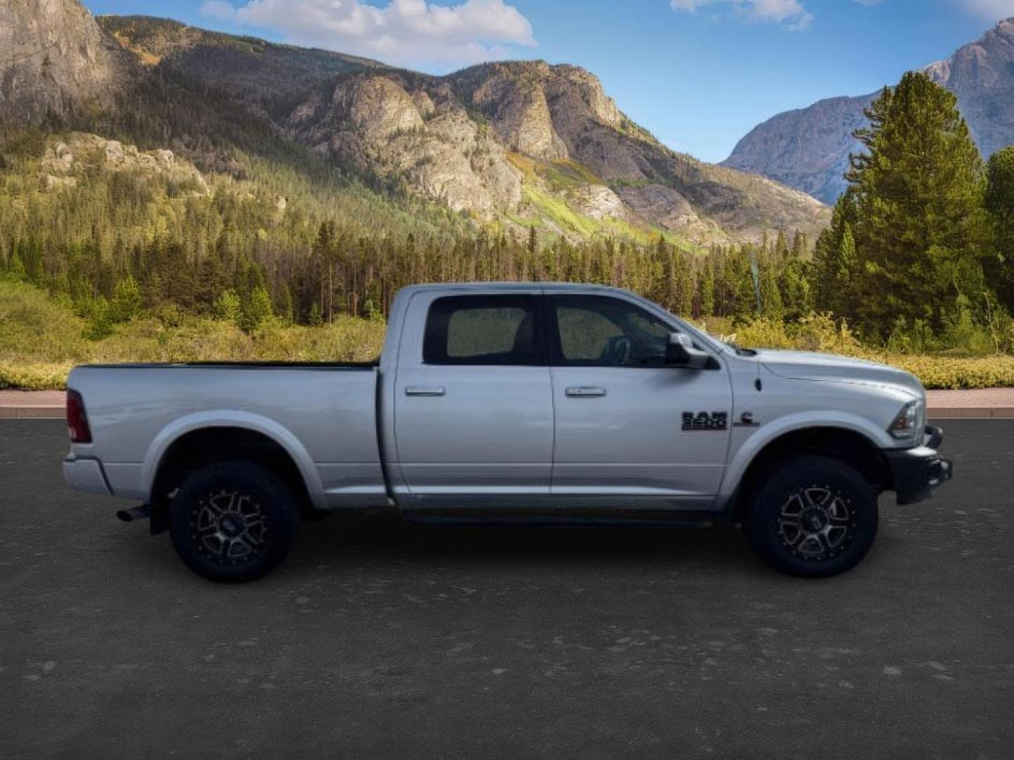 2018 SILVER /Black Ram 3500 (3C63R3EL4JG) with an Cummins 67L I-6 diesel direct injection engine, Automatic transmission, located at 1175 N Woodruff Ave, Idaho Falls, ID, 83401, 43.506901, -111.999657 - At Timberline Auto, finding a great deal on your next vehicle is always easy! Our experienced sales staff's goal is to help find you the right vehicle at the right price! Our knowledgeable finance department has options for almost any credit score. We offer extended service contract options to prote - Photo#7