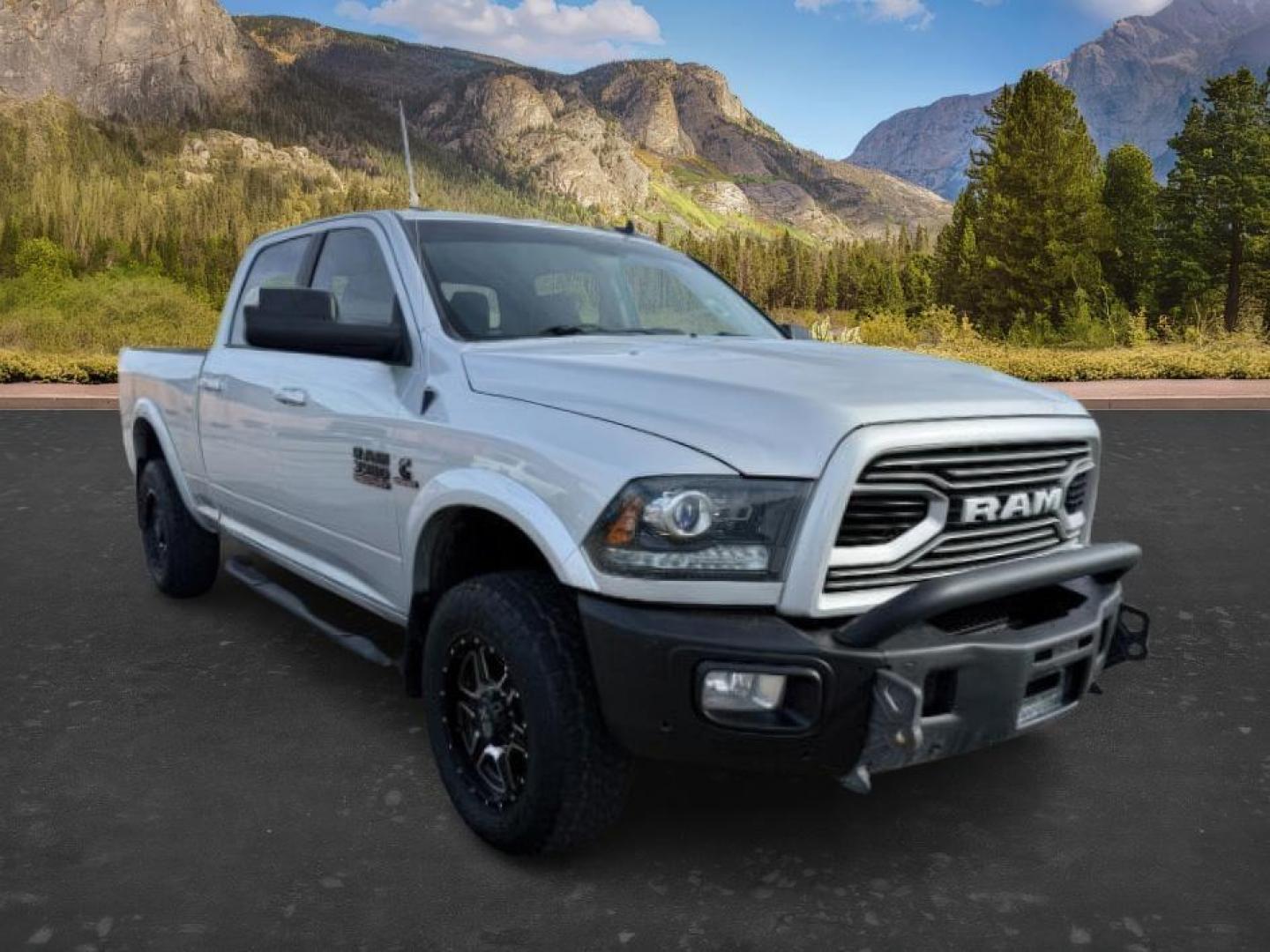 2018 SILVER /Black Ram 3500 (3C63R3EL4JG) with an Cummins 67L I-6 diesel direct injection engine, Automatic transmission, located at 1175 N Woodruff Ave, Idaho Falls, ID, 83401, 43.506901, -111.999657 - At Timberline Auto, finding a great deal on your next vehicle is always easy! Our experienced sales staff's goal is to help find you the right vehicle at the right price! Our knowledgeable finance department has options for almost any credit score. We offer extended service contract options to prote - Photo#8