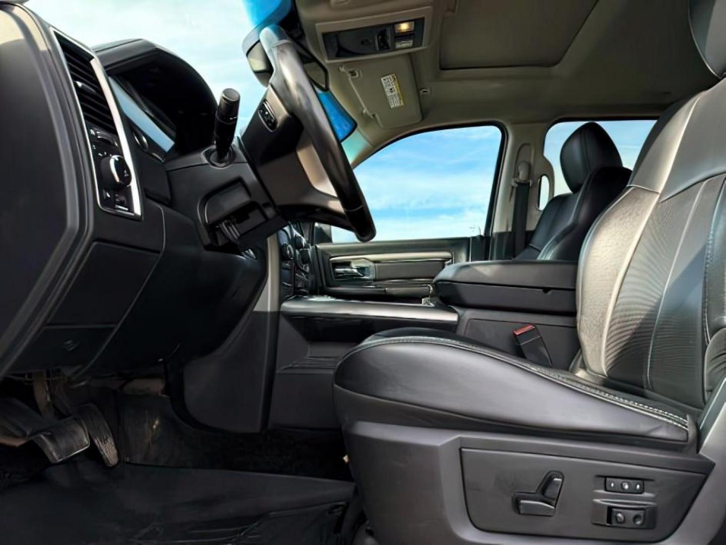 2018 SILVER /Black Ram 3500 (3C63R3EL4JG) with an Cummins 67L I-6 diesel direct injection engine, Automatic transmission, located at 1175 N Woodruff Ave, Idaho Falls, ID, 83401, 43.506901, -111.999657 - At Timberline Auto, finding a great deal on your next vehicle is always easy! Our experienced sales staff's goal is to help find you the right vehicle at the right price! Our knowledgeable finance department has options for almost any credit score. We offer extended service contract options to prote - Photo#11