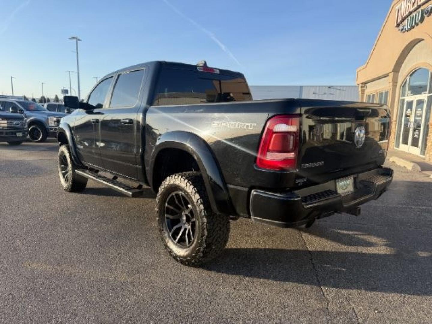 2021 BLACK /Diesel Gray/Black Ram 1500 Big Horn Crew Cab 4x4 5'7 Box (1C6SRFFT5MN) with an HEMI 5.7L V-8 variable valve control engine, AUTOMATIC transmission, located at 1235 N Woodruff Ave., Idaho Falls, 83401, (208) 523-1053, 43.507172, -112.000488 - At Timberline Auto, finding a great deal on your next vehicle is always easy! Our experienced sales staff's goal is to help find you the right vehicle at the right price! Our knowledgeable finance department has options for almost any credit score. We offer extended service contract options to prote - Photo#3