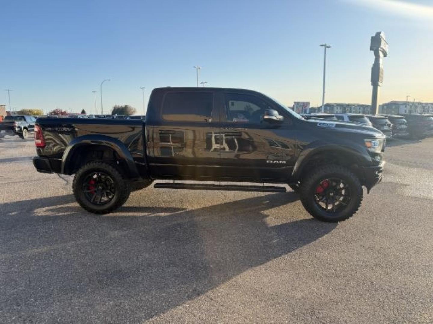 2021 BLACK /Diesel Gray/Black Ram 1500 Big Horn Crew Cab 4x4 5'7 Box (1C6SRFFT5MN) with an HEMI 5.7L V-8 variable valve control engine, AUTOMATIC transmission, located at 1235 N Woodruff Ave., Idaho Falls, 83401, (208) 523-1053, 43.507172, -112.000488 - At Timberline Auto, finding a great deal on your next vehicle is always easy! Our experienced sales staff's goal is to help find you the right vehicle at the right price! Our knowledgeable finance department has options for almost any credit score. We offer extended service contract options to prote - Photo#8