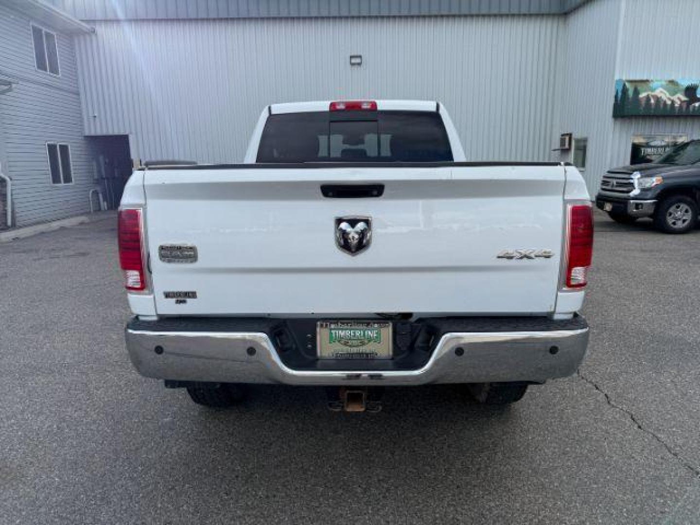 2013 Bright White Clearcoat /Light Frost Beige/Canyon Brown Ram 2500 (3C6UR5GL1DG) with an Cummins 67L I-6 diesel direct injection engine, Automatic transmission, located at 1175 N Woodruff Ave, Idaho Falls, ID, 83401, 43.506901, -111.999657 - At Timberline Auto, finding a great deal on your next vehicle is always easy! Our experienced sales staff's goal is to help find you the right vehicle at the right price! Our knowledgeable finance department has options for almost any credit score. We offer extended service contract options to prote - Photo#31