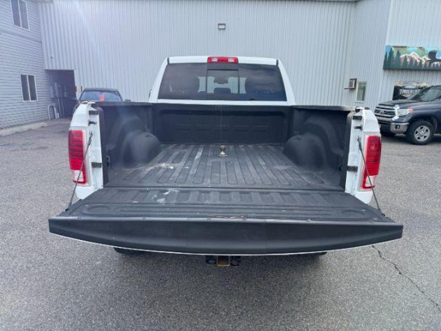 2013 Bright White Clearcoat /Light Frost Beige/Canyon Brown Ram 2500 (3C6UR5GL1DG) with an Cummins 67L I-6 diesel direct injection engine, Automatic transmission, located at 1175 N Woodruff Ave, Idaho Falls, ID, 83401, 43.506901, -111.999657 - At Timberline Auto, finding a great deal on your next vehicle is always easy! Our experienced sales staff's goal is to help find you the right vehicle at the right price! Our knowledgeable finance department has options for almost any credit score. We offer extended service contract options to prote - Photo#33