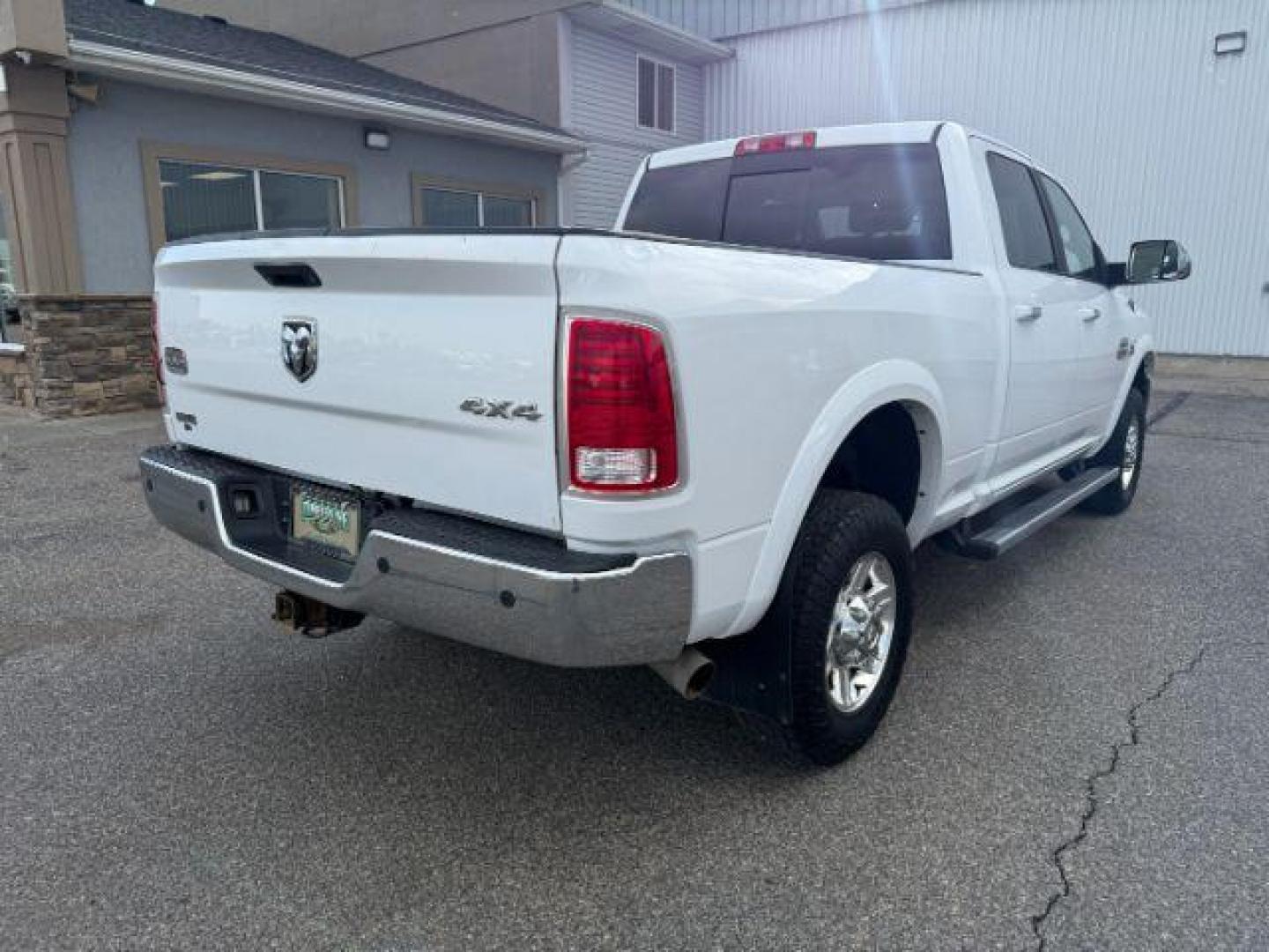 2013 Bright White Clearcoat /Light Frost Beige/Canyon Brown Ram 2500 (3C6UR5GL1DG) with an Cummins 67L I-6 diesel direct injection engine, Automatic transmission, located at 1175 N Woodruff Ave, Idaho Falls, ID, 83401, 43.506901, -111.999657 - At Timberline Auto, finding a great deal on your next vehicle is always easy! Our experienced sales staff's goal is to help find you the right vehicle at the right price! Our knowledgeable finance department has options for almost any credit score. We offer extended service contract options to prote - Photo#34