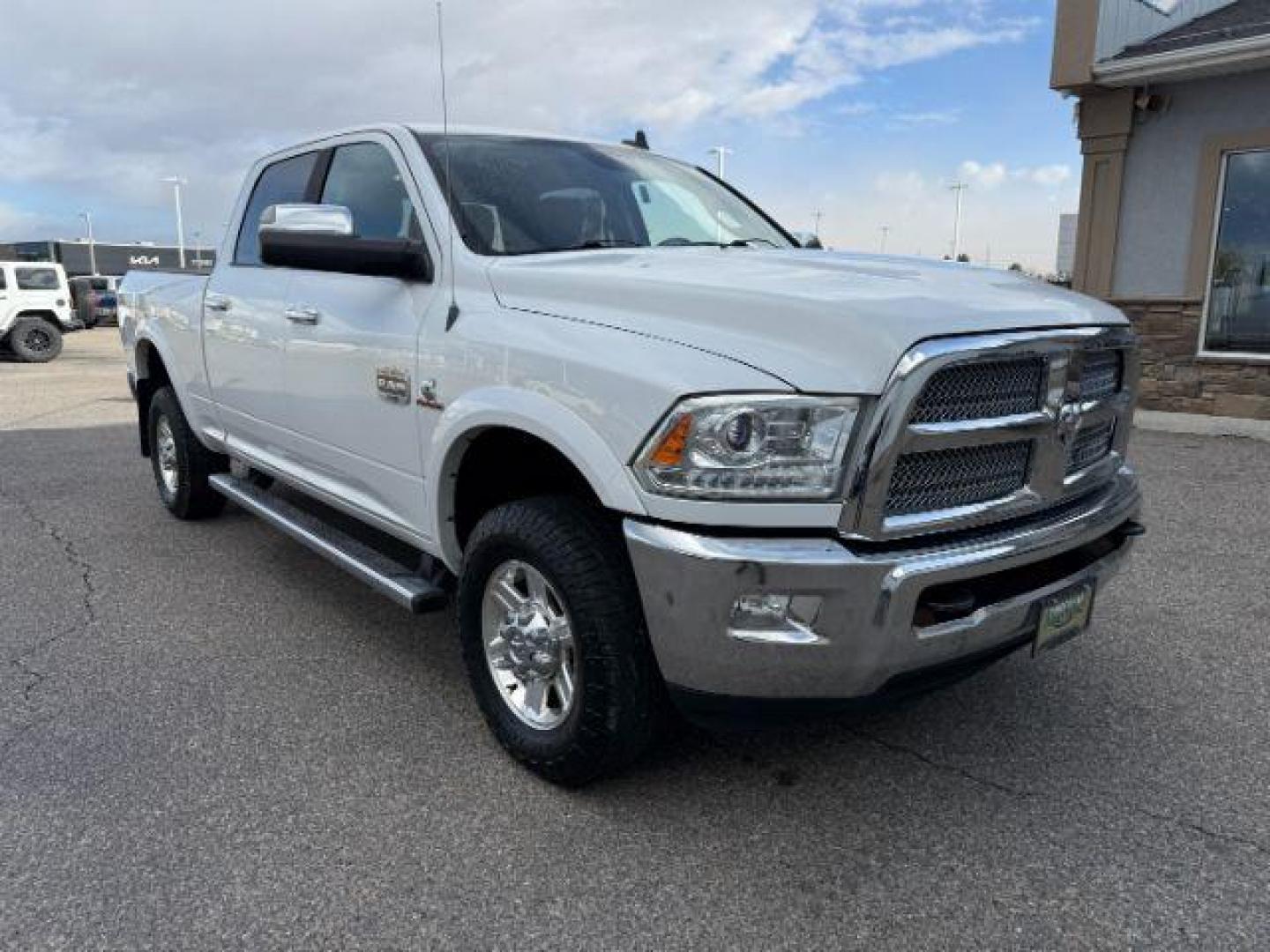 2013 Bright White Clearcoat /Light Frost Beige/Canyon Brown Ram 2500 (3C6UR5GL1DG) with an Cummins 67L I-6 diesel direct injection engine, Automatic transmission, located at 1175 N Woodruff Ave, Idaho Falls, ID, 83401, 43.506901, -111.999657 - At Timberline Auto, finding a great deal on your next vehicle is always easy! Our experienced sales staff's goal is to help find you the right vehicle at the right price! Our knowledgeable finance department has options for almost any credit score. We offer extended service contract options to prote - Photo#36