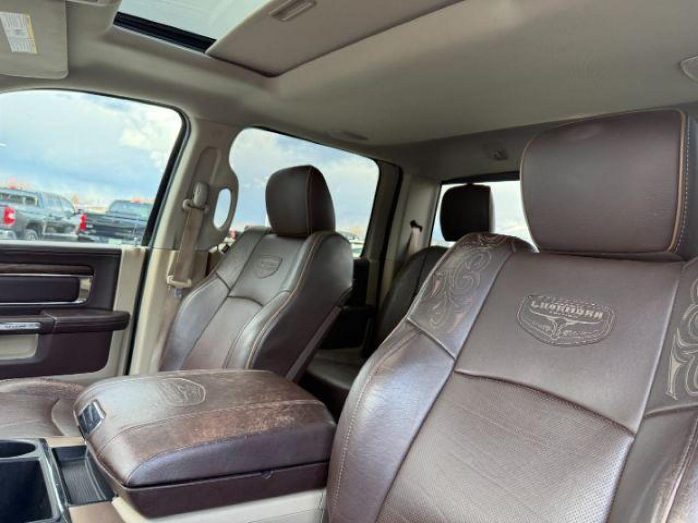 2013 Bright White Clearcoat /Light Frost Beige/Canyon Brown Ram 2500 (3C6UR5GL1DG) with an Cummins 67L I-6 diesel direct injection engine, Automatic transmission, located at 1175 N Woodruff Ave, Idaho Falls, ID, 83401, 43.506901, -111.999657 - At Timberline Auto, finding a great deal on your next vehicle is always easy! Our experienced sales staff's goal is to help find you the right vehicle at the right price! Our knowledgeable finance department has options for almost any credit score. We offer extended service contract options to prote - Photo#50