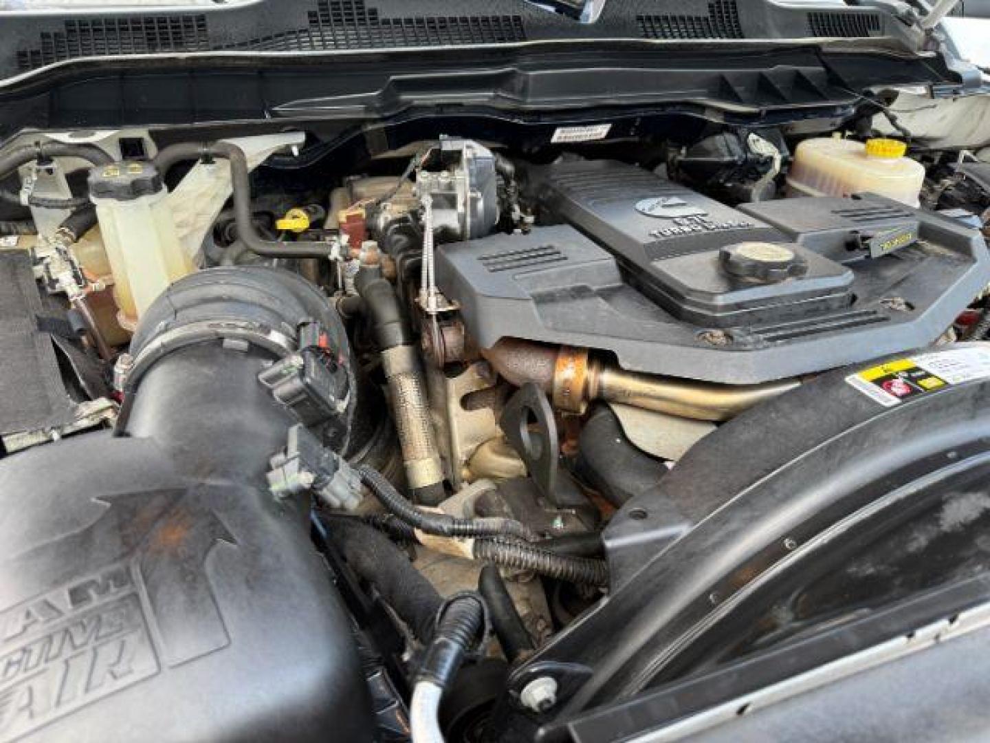 2013 Bright White Clearcoat /Light Frost Beige/Canyon Brown Ram 2500 (3C6UR5GL1DG) with an Cummins 67L I-6 diesel direct injection engine, Automatic transmission, located at 1175 N Woodruff Ave, Idaho Falls, ID, 83401, 43.506901, -111.999657 - At Timberline Auto, finding a great deal on your next vehicle is always easy! Our experienced sales staff's goal is to help find you the right vehicle at the right price! Our knowledgeable finance department has options for almost any credit score. We offer extended service contract options to prote - Photo#55