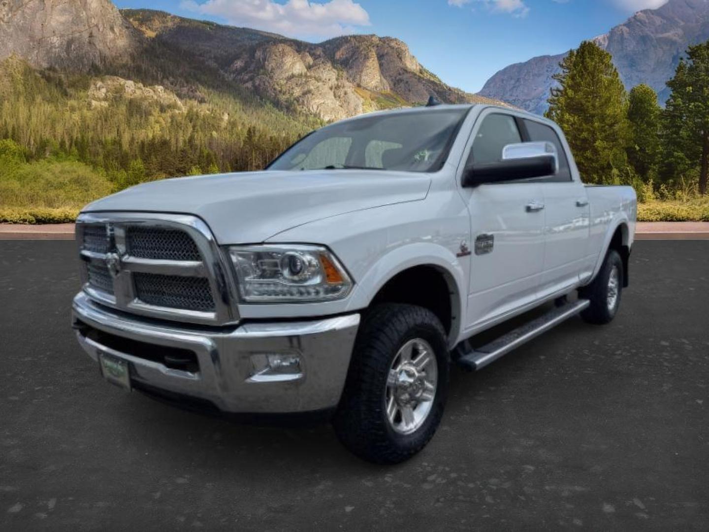 2013 Bright White Clearcoat /Light Frost Beige/Canyon Brown Ram 2500 (3C6UR5GL1DG) with an Cummins 67L I-6 diesel direct injection engine, Automatic transmission, located at 1175 N Woodruff Ave, Idaho Falls, ID, 83401, 43.506901, -111.999657 - At Timberline Auto, finding a great deal on your next vehicle is always easy! Our experienced sales staff's goal is to help find you the right vehicle at the right price! Our knowledgeable finance department has options for almost any credit score. We offer extended service contract options to prote - Photo#0