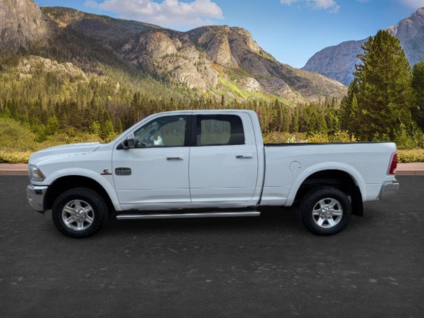 2013 Bright White Clearcoat /Light Frost Beige/Canyon Brown Ram 2500 (3C6UR5GL1DG) with an Cummins 67L I-6 diesel direct injection engine, Automatic transmission, located at 1175 N Woodruff Ave, Idaho Falls, ID, 83401, 43.506901, -111.999657 - At Timberline Auto, finding a great deal on your next vehicle is always easy! Our experienced sales staff's goal is to help find you the right vehicle at the right price! Our knowledgeable finance department has options for almost any credit score. We offer extended service contract options to prote - Photo#1