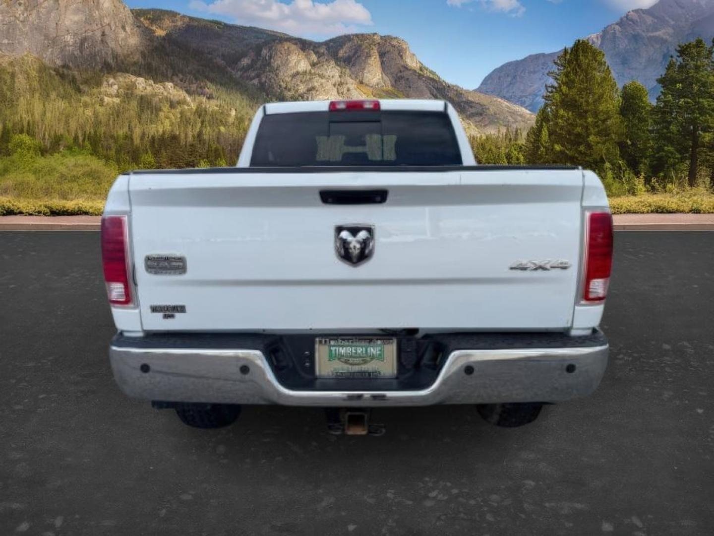 2013 Bright White Clearcoat /Light Frost Beige/Canyon Brown Ram 2500 (3C6UR5GL1DG) with an Cummins 67L I-6 diesel direct injection engine, Automatic transmission, located at 1175 N Woodruff Ave, Idaho Falls, ID, 83401, 43.506901, -111.999657 - At Timberline Auto, finding a great deal on your next vehicle is always easy! Our experienced sales staff's goal is to help find you the right vehicle at the right price! Our knowledgeable finance department has options for almost any credit score. We offer extended service contract options to prote - Photo#3