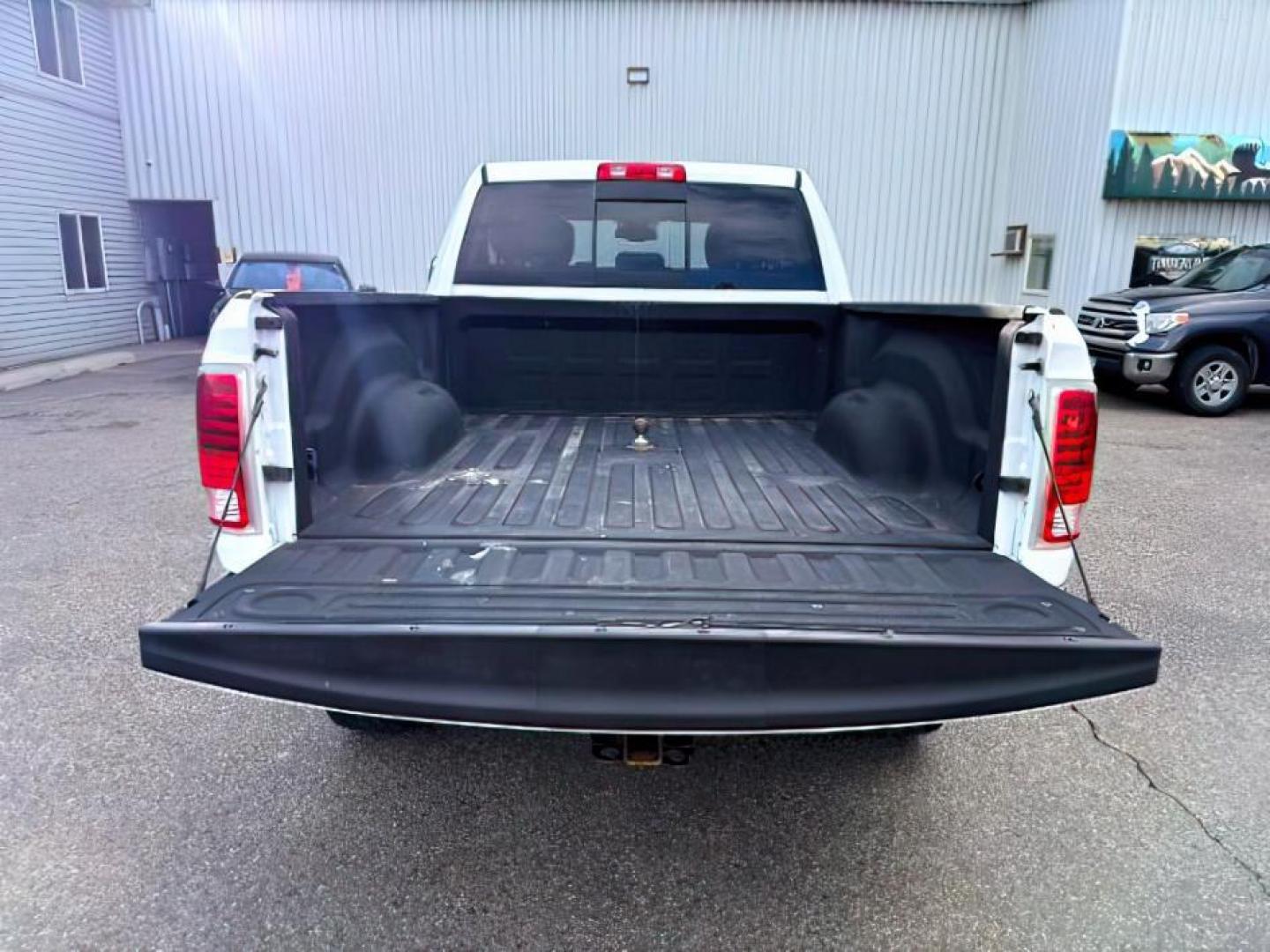 2013 Bright White Clearcoat /Light Frost Beige/Canyon Brown Ram 2500 (3C6UR5GL1DG) with an Cummins 67L I-6 diesel direct injection engine, Automatic transmission, located at 1175 N Woodruff Ave, Idaho Falls, ID, 83401, 43.506901, -111.999657 - At Timberline Auto, finding a great deal on your next vehicle is always easy! Our experienced sales staff's goal is to help find you the right vehicle at the right price! Our knowledgeable finance department has options for almost any credit score. We offer extended service contract options to prote - Photo#5