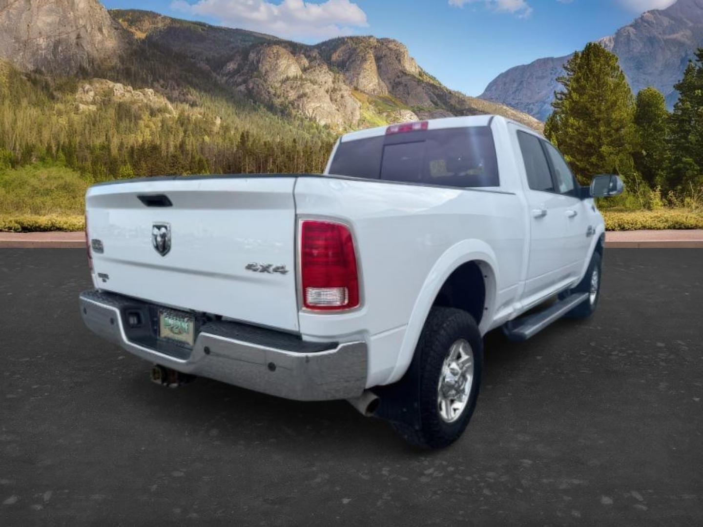 2013 Bright White Clearcoat /Light Frost Beige/Canyon Brown Ram 2500 (3C6UR5GL1DG) with an Cummins 67L I-6 diesel direct injection engine, Automatic transmission, located at 1175 N Woodruff Ave, Idaho Falls, ID, 83401, 43.506901, -111.999657 - At Timberline Auto, finding a great deal on your next vehicle is always easy! Our experienced sales staff's goal is to help find you the right vehicle at the right price! Our knowledgeable finance department has options for almost any credit score. We offer extended service contract options to prote - Photo#6