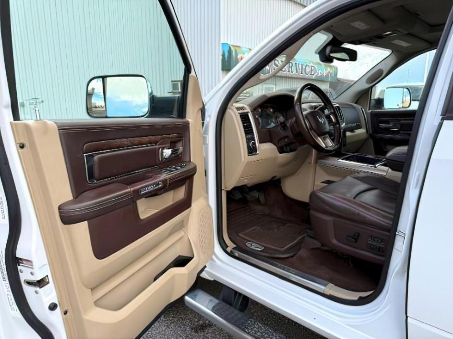2013 Bright White Clearcoat /Light Frost Beige/Canyon Brown Ram 2500 (3C6UR5GL1DG) with an Cummins 67L I-6 diesel direct injection engine, Automatic transmission, located at 1175 N Woodruff Ave, Idaho Falls, ID, 83401, 43.506901, -111.999657 - At Timberline Auto, finding a great deal on your next vehicle is always easy! Our experienced sales staff's goal is to help find you the right vehicle at the right price! Our knowledgeable finance department has options for almost any credit score. We offer extended service contract options to prote - Photo#13