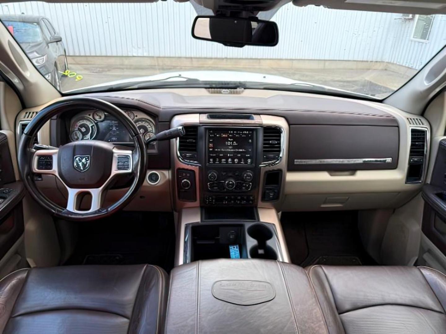 2013 Bright White Clearcoat /Light Frost Beige/Canyon Brown Ram 2500 (3C6UR5GL1DG) with an Cummins 67L I-6 diesel direct injection engine, Automatic transmission, located at 1175 N Woodruff Ave, Idaho Falls, ID, 83401, 43.506901, -111.999657 - At Timberline Auto, finding a great deal on your next vehicle is always easy! Our experienced sales staff's goal is to help find you the right vehicle at the right price! Our knowledgeable finance department has options for almost any credit score. We offer extended service contract options to prote - Photo#24