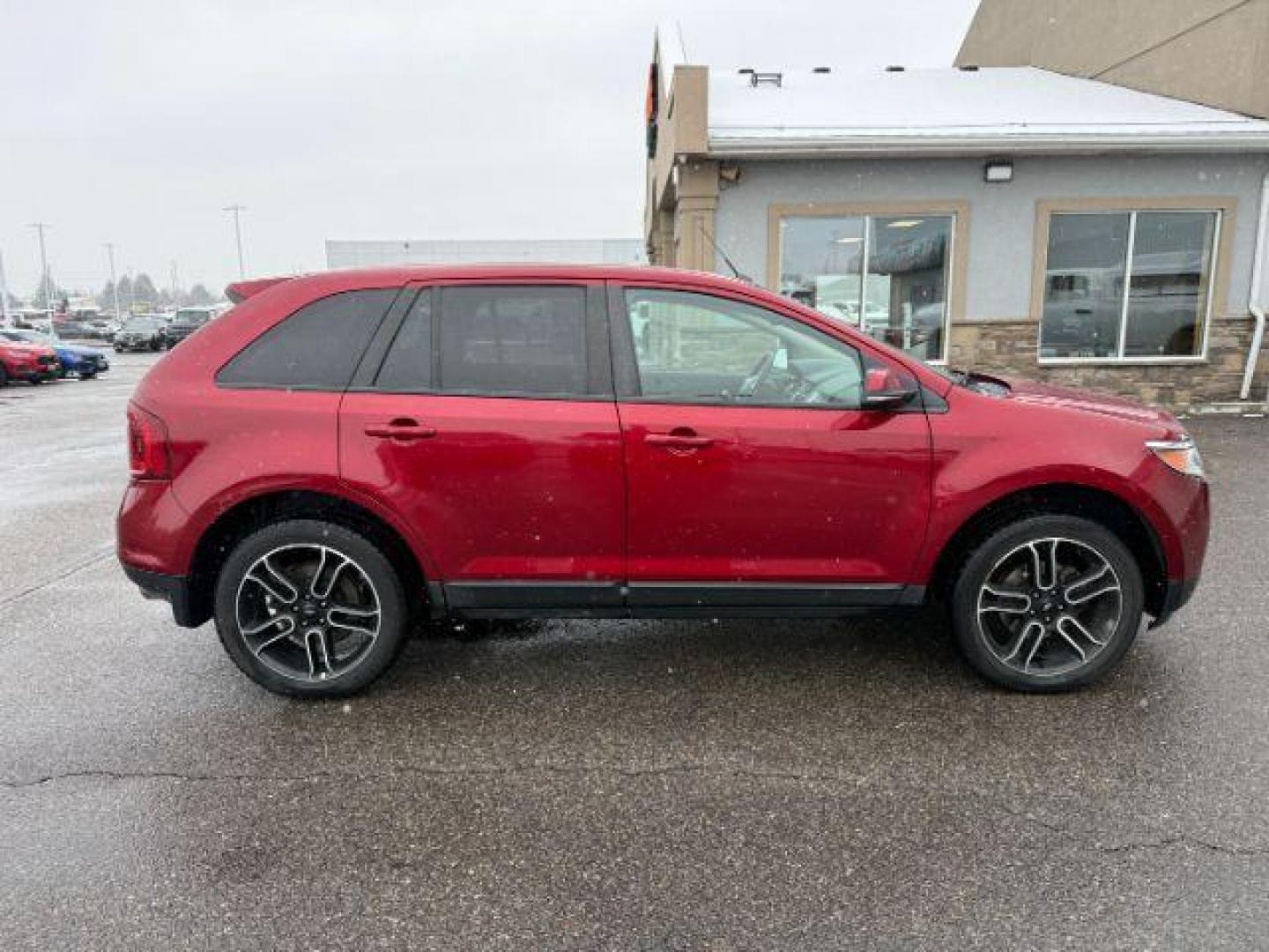 2014 Ruby Red Metallic Tinted Clearcoat /Charcoal Black Ford Edge (2FMDK4JC0EB) with an 35L V-6 DOHC engine, Automatic transmission, located at 1175 N Woodruff Ave, Idaho Falls, ID, 83401, 43.506901, -111.999657 - At Timberline Auto, finding a great deal on your next vehicle is always easy! Our experienced sales staff's goal is to help find you the right vehicle at the right price! Our knowledgeable finance department has options for almost any credit score. We offer extended service contract options to prote - Photo#8