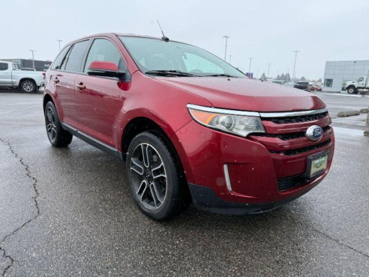 2014 Ruby Red Metallic Tinted Clearcoat /Charcoal Black Ford Edge (2FMDK4JC0EB) with an 35L V-6 DOHC engine, Automatic transmission, located at 1175 N Woodruff Ave, Idaho Falls, ID, 83401, 43.506901, -111.999657 - At Timberline Auto, finding a great deal on your next vehicle is always easy! Our experienced sales staff's goal is to help find you the right vehicle at the right price! Our knowledgeable finance department has options for almost any credit score. We offer extended service contract options to prote - Photo#9