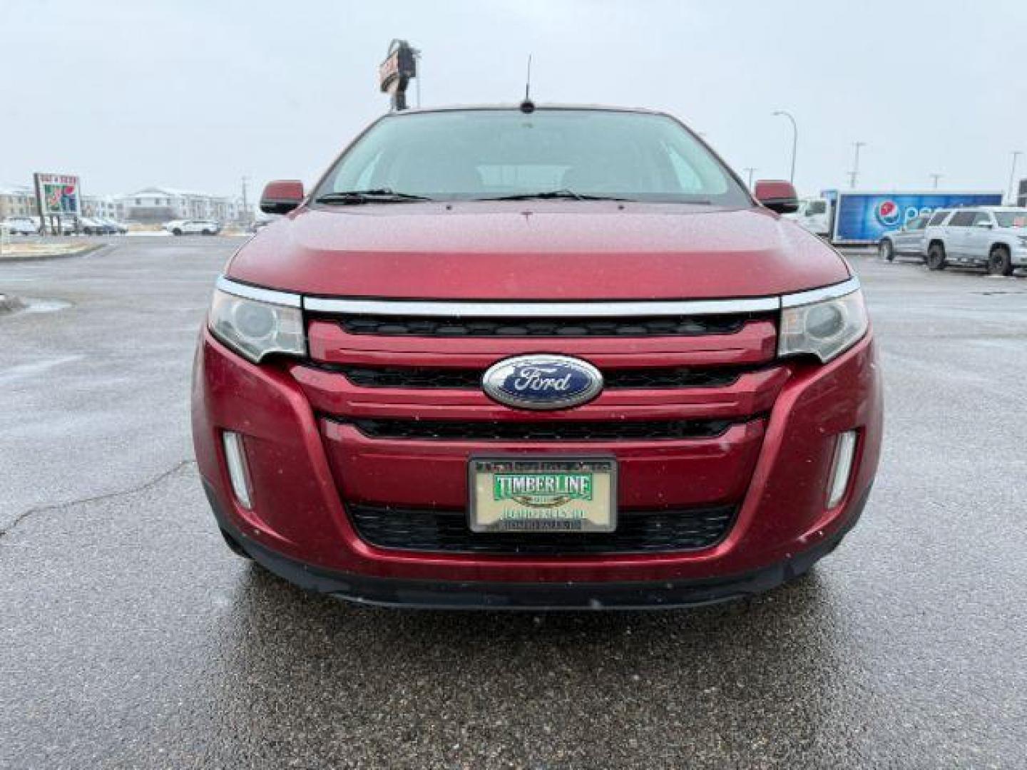2014 Ruby Red Metallic Tinted Clearcoat /Charcoal Black Ford Edge (2FMDK4JC0EB) with an 35L V-6 DOHC engine, Automatic transmission, located at 1175 N Woodruff Ave, Idaho Falls, ID, 83401, 43.506901, -111.999657 - At Timberline Auto, finding a great deal on your next vehicle is always easy! Our experienced sales staff's goal is to help find you the right vehicle at the right price! Our knowledgeable finance department has options for almost any credit score. We offer extended service contract options to prote - Photo#10