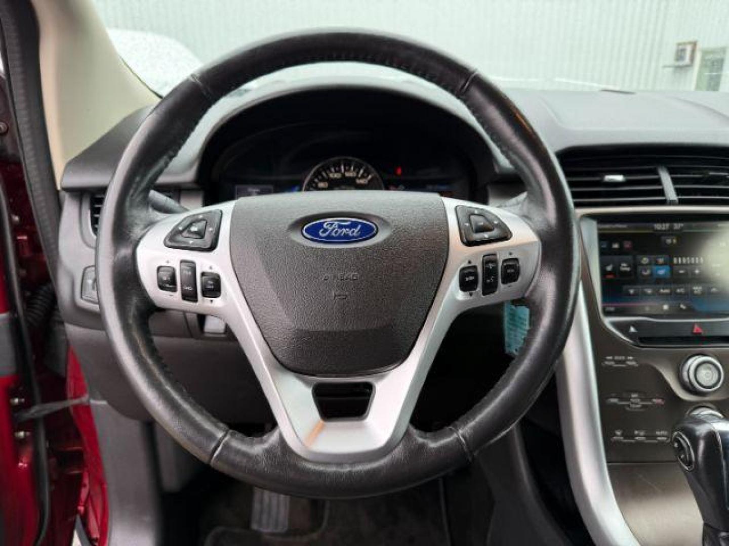 2014 Ruby Red Metallic Tinted Clearcoat /Charcoal Black Ford Edge (2FMDK4JC0EB) with an 35L V-6 DOHC engine, Automatic transmission, located at 1175 N Woodruff Ave, Idaho Falls, ID, 83401, 43.506901, -111.999657 - At Timberline Auto, finding a great deal on your next vehicle is always easy! Our experienced sales staff's goal is to help find you the right vehicle at the right price! Our knowledgeable finance department has options for almost any credit score. We offer extended service contract options to prote - Photo#15