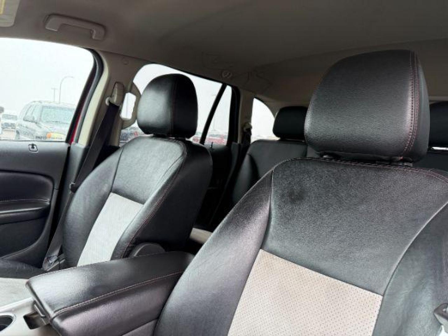 2014 Ruby Red Metallic Tinted Clearcoat /Charcoal Black Ford Edge (2FMDK4JC0EB) with an 35L V-6 DOHC engine, Automatic transmission, located at 1175 N Woodruff Ave, Idaho Falls, ID, 83401, 43.506901, -111.999657 - At Timberline Auto, finding a great deal on your next vehicle is always easy! Our experienced sales staff's goal is to help find you the right vehicle at the right price! Our knowledgeable finance department has options for almost any credit score. We offer extended service contract options to prote - Photo#17