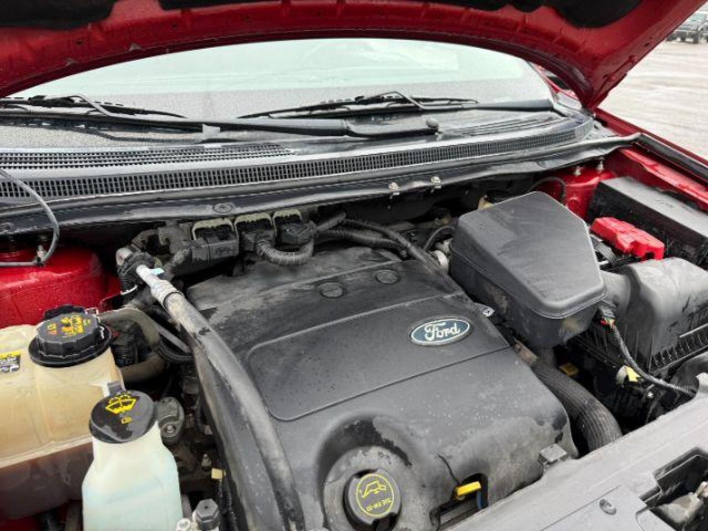 2014 Ruby Red Metallic Tinted Clearcoat /Charcoal Black Ford Edge (2FMDK4JC0EB) with an 35L V-6 DOHC engine, Automatic transmission, located at 1175 N Woodruff Ave, Idaho Falls, ID, 83401, 43.506901, -111.999657 - At Timberline Auto, finding a great deal on your next vehicle is always easy! Our experienced sales staff's goal is to help find you the right vehicle at the right price! Our knowledgeable finance department has options for almost any credit score. We offer extended service contract options to prote - Photo#21