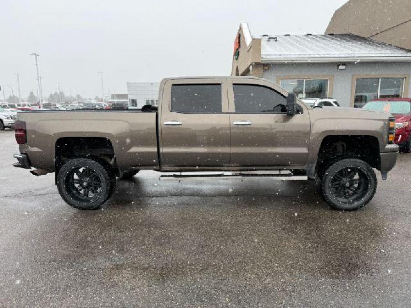 2014 Brownstone Metallic /Cocoa/Dune Chevrolet Silverado 1500 (3GCUKREC5EG) with an EcoTec3 53L V-8 gasoline direct injection engine, Automatic transmission, located at 1175 N Woodruff Ave, Idaho Falls, ID, 83401, 43.506901, -111.999657 - At Timberline Auto, finding a great deal on your next vehicle is always easy! Our experienced sales staff's goal is to help find you the right vehicle at the right price! Our knowledgeable finance department has options for almost any credit score. We offer extended service contract options to prote - Photo#27