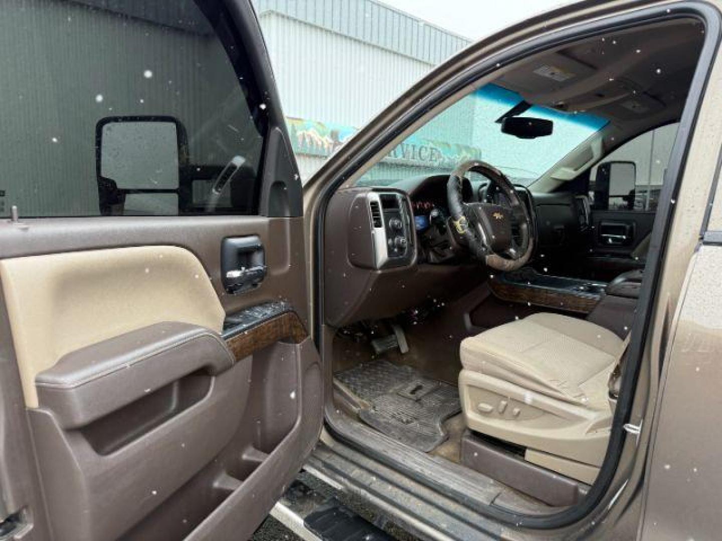 2014 Brownstone Metallic /Cocoa/Dune Chevrolet Silverado 1500 (3GCUKREC5EG) with an EcoTec3 53L V-8 gasoline direct injection engine, Automatic transmission, located at 1175 N Woodruff Ave, Idaho Falls, ID, 83401, 43.506901, -111.999657 - At Timberline Auto, finding a great deal on your next vehicle is always easy! Our experienced sales staff's goal is to help find you the right vehicle at the right price! Our knowledgeable finance department has options for almost any credit score. We offer extended service contract options to prote - Photo#31