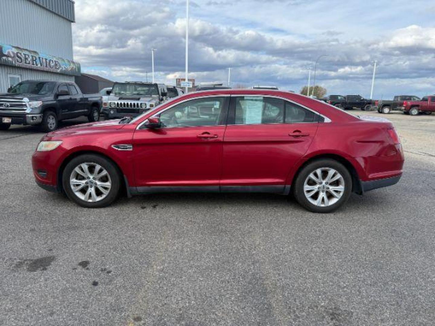2011 RED /Charcoal Black Ford Taurus (1FAHP2HW3BG) with an Duratec 35L V-6 DOHC engine, Automatic transmission, located at 1175 N Woodruff Ave, Idaho Falls, ID, 83401, 43.506901, -111.999657 - At Timberline Auto, finding a great deal on your next vehicle is always easy! Our experienced sales staff's goal is to help find you the right vehicle at the right price! Our knowledgeable finance department has options for almost any credit score. We offer extended service contract options to prote - Photo#1