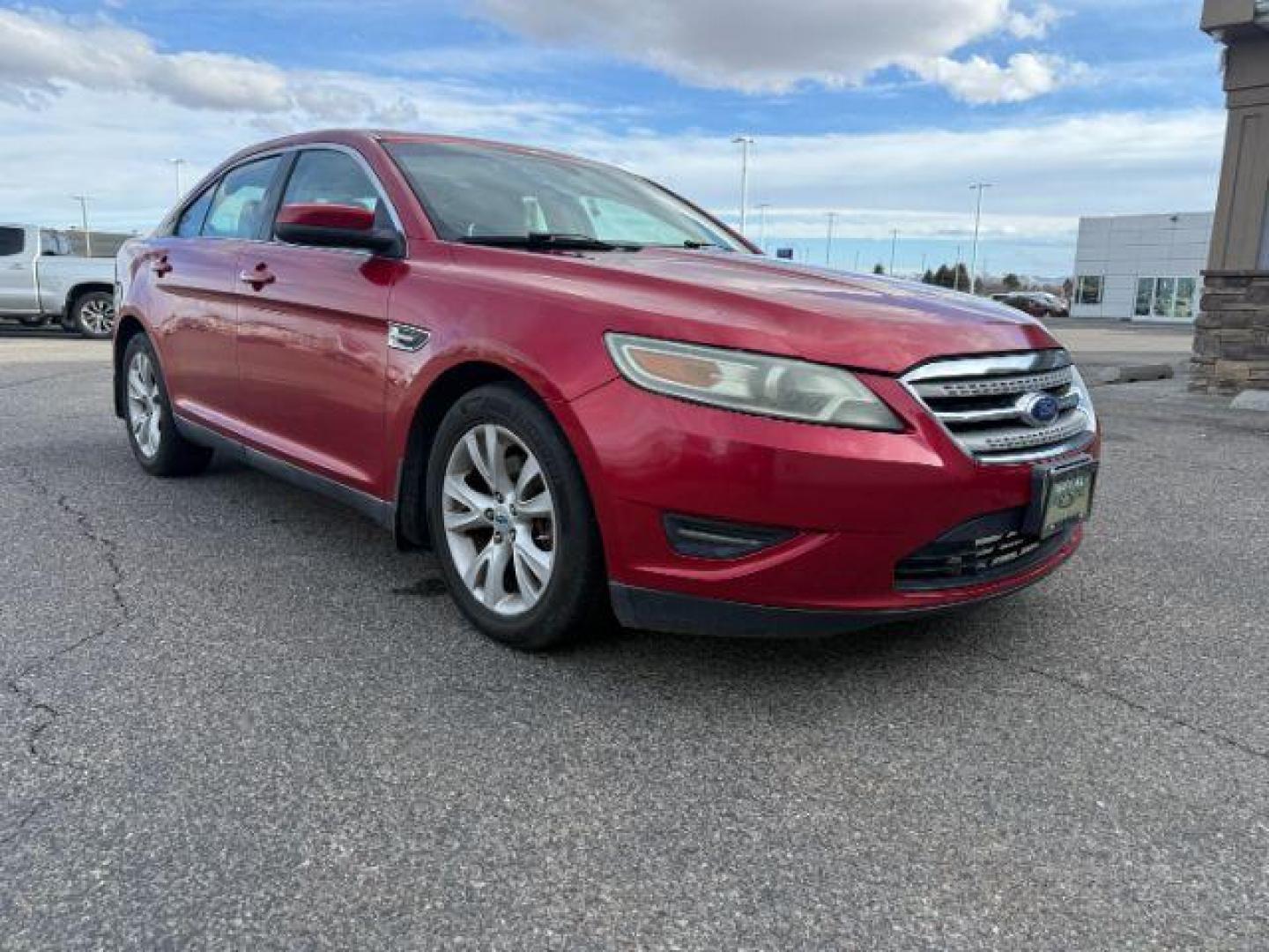 2011 RED /Charcoal Black Ford Taurus (1FAHP2HW3BG) with an Duratec 35L V-6 DOHC engine, Automatic transmission, located at 1175 N Woodruff Ave, Idaho Falls, ID, 83401, 43.506901, -111.999657 - At Timberline Auto, finding a great deal on your next vehicle is always easy! Our experienced sales staff's goal is to help find you the right vehicle at the right price! Our knowledgeable finance department has options for almost any credit score. We offer extended service contract options to prote - Photo#5
