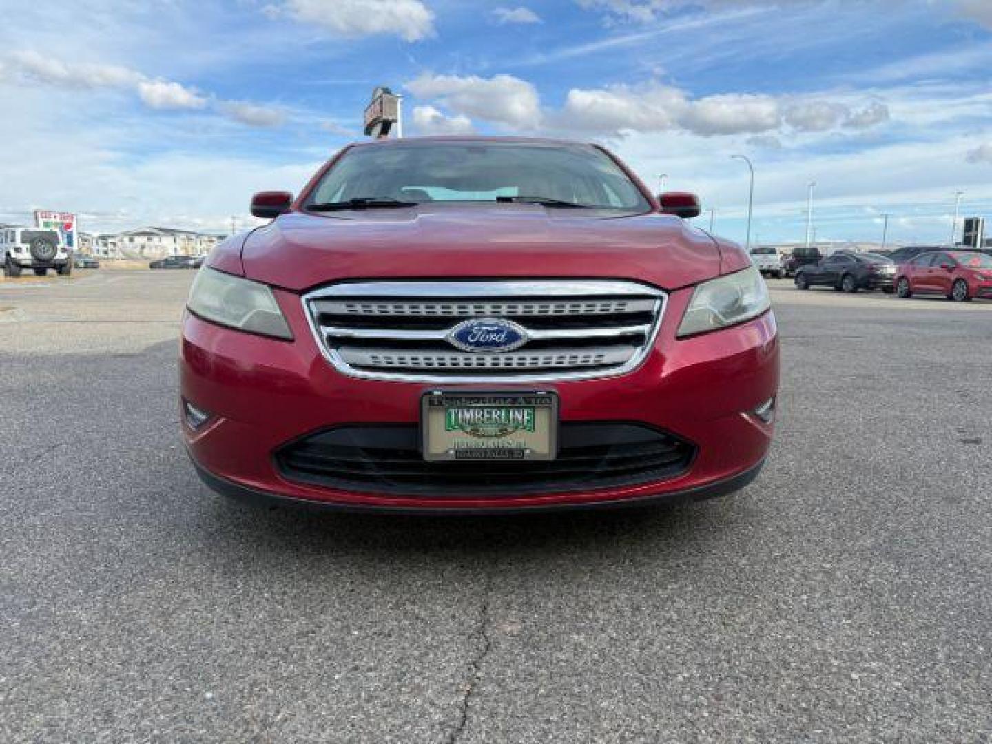 2011 RED /Charcoal Black Ford Taurus (1FAHP2HW3BG) with an Duratec 35L V-6 DOHC engine, Automatic transmission, located at 1175 N Woodruff Ave, Idaho Falls, ID, 83401, 43.506901, -111.999657 - At Timberline Auto, finding a great deal on your next vehicle is always easy! Our experienced sales staff's goal is to help find you the right vehicle at the right price! Our knowledgeable finance department has options for almost any credit score. We offer extended service contract options to prote - Photo#6
