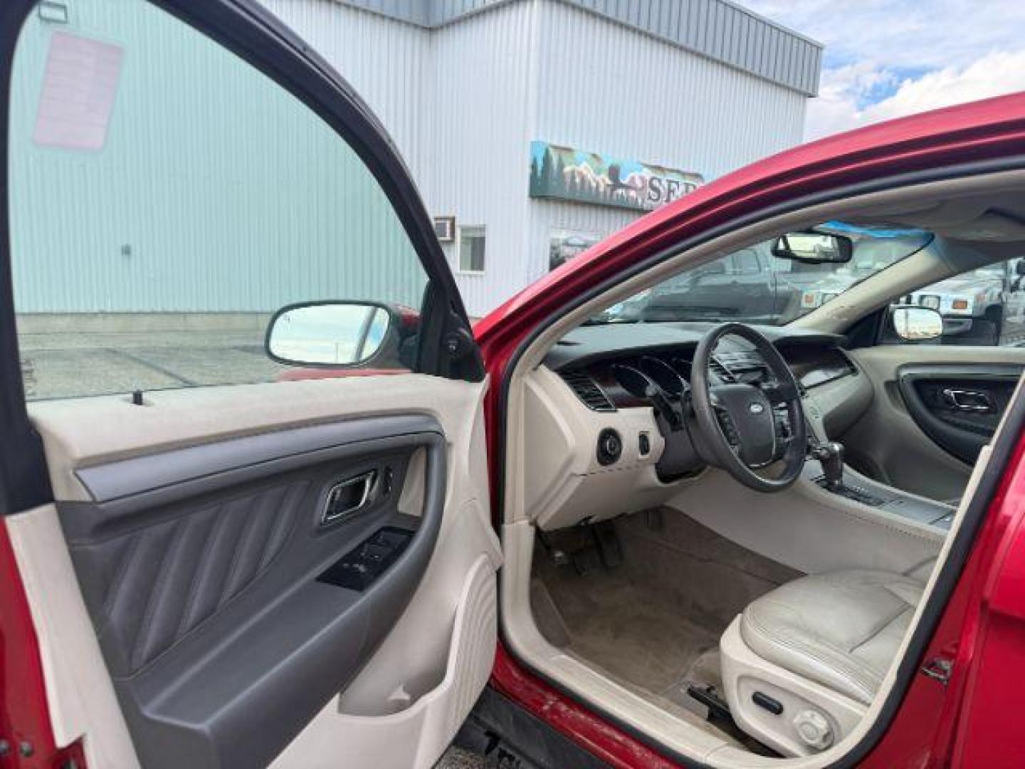 2011 RED /Charcoal Black Ford Taurus (1FAHP2HW3BG) with an Duratec 35L V-6 DOHC engine, Automatic transmission, located at 1175 N Woodruff Ave, Idaho Falls, ID, 83401, 43.506901, -111.999657 - At Timberline Auto, finding a great deal on your next vehicle is always easy! Our experienced sales staff's goal is to help find you the right vehicle at the right price! Our knowledgeable finance department has options for almost any credit score. We offer extended service contract options to prote - Photo#8