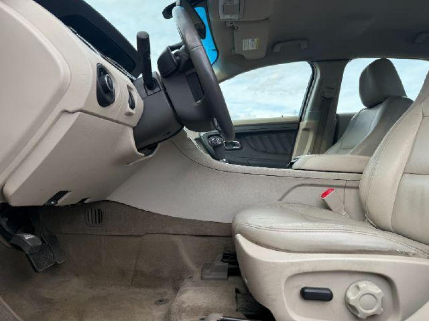 2011 RED /Charcoal Black Ford Taurus (1FAHP2HW3BG) with an Duratec 35L V-6 DOHC engine, Automatic transmission, located at 1175 N Woodruff Ave, Idaho Falls, ID, 83401, 43.506901, -111.999657 - At Timberline Auto, finding a great deal on your next vehicle is always easy! Our experienced sales staff's goal is to help find you the right vehicle at the right price! Our knowledgeable finance department has options for almost any credit score. We offer extended service contract options to prote - Photo#9