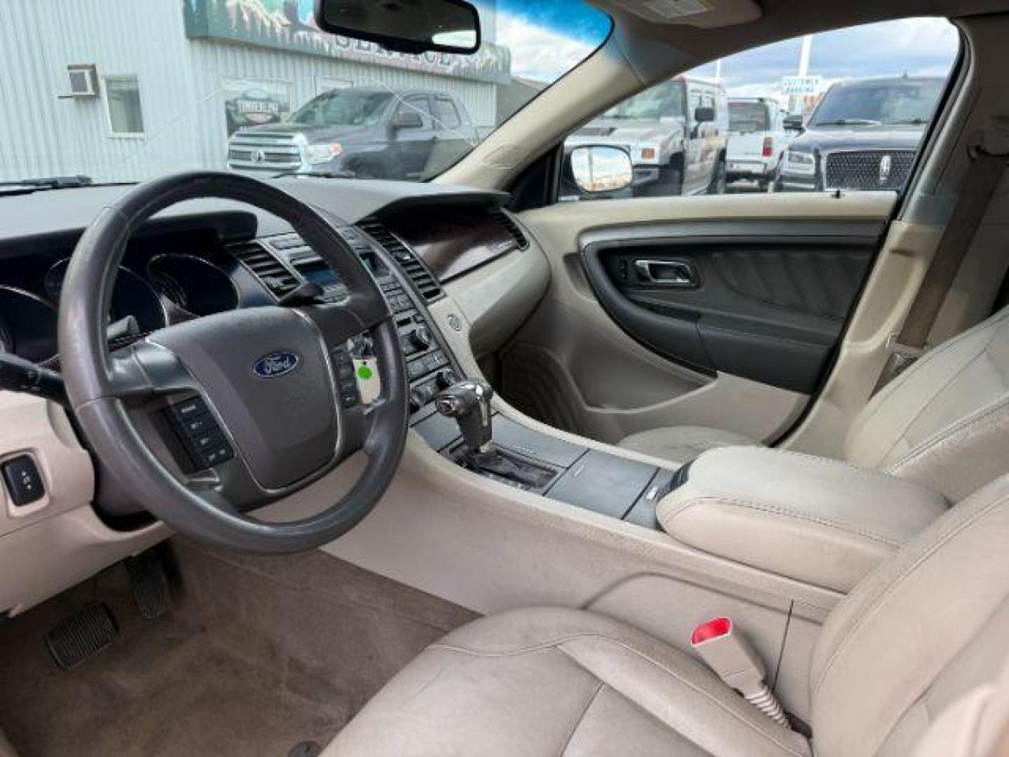 2011 RED /Charcoal Black Ford Taurus (1FAHP2HW3BG) with an Duratec 35L V-6 DOHC engine, Automatic transmission, located at 1175 N Woodruff Ave, Idaho Falls, ID, 83401, 43.506901, -111.999657 - At Timberline Auto, finding a great deal on your next vehicle is always easy! Our experienced sales staff's goal is to help find you the right vehicle at the right price! Our knowledgeable finance department has options for almost any credit score. We offer extended service contract options to prote - Photo#10