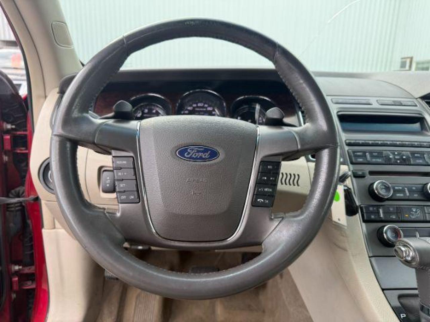 2011 RED /Charcoal Black Ford Taurus (1FAHP2HW3BG) with an Duratec 35L V-6 DOHC engine, Automatic transmission, located at 1175 N Woodruff Ave, Idaho Falls, ID, 83401, 43.506901, -111.999657 - At Timberline Auto, finding a great deal on your next vehicle is always easy! Our experienced sales staff's goal is to help find you the right vehicle at the right price! Our knowledgeable finance department has options for almost any credit score. We offer extended service contract options to prote - Photo#11